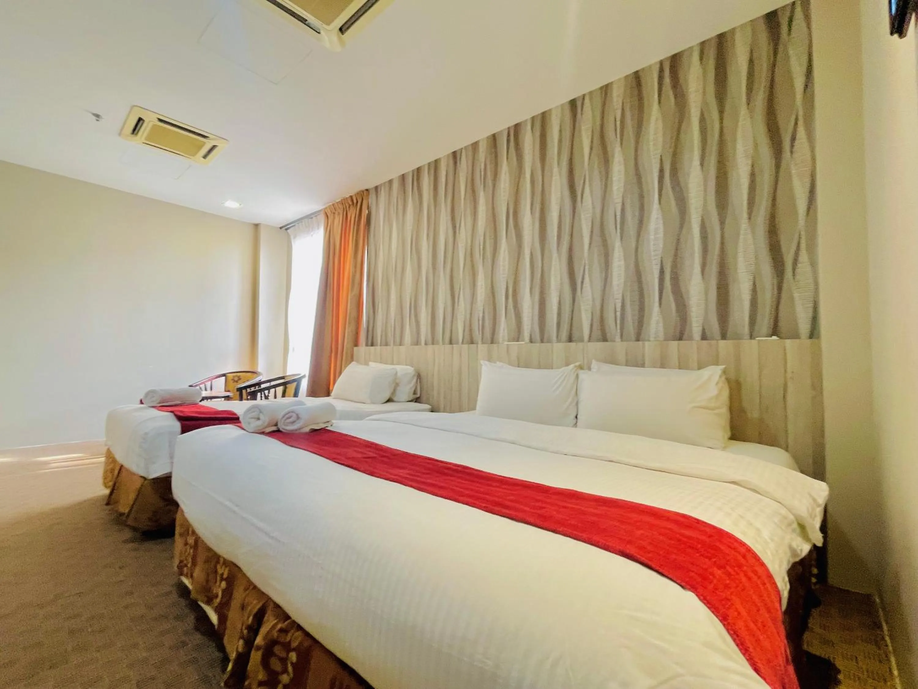 Bed in La Boss Hotel