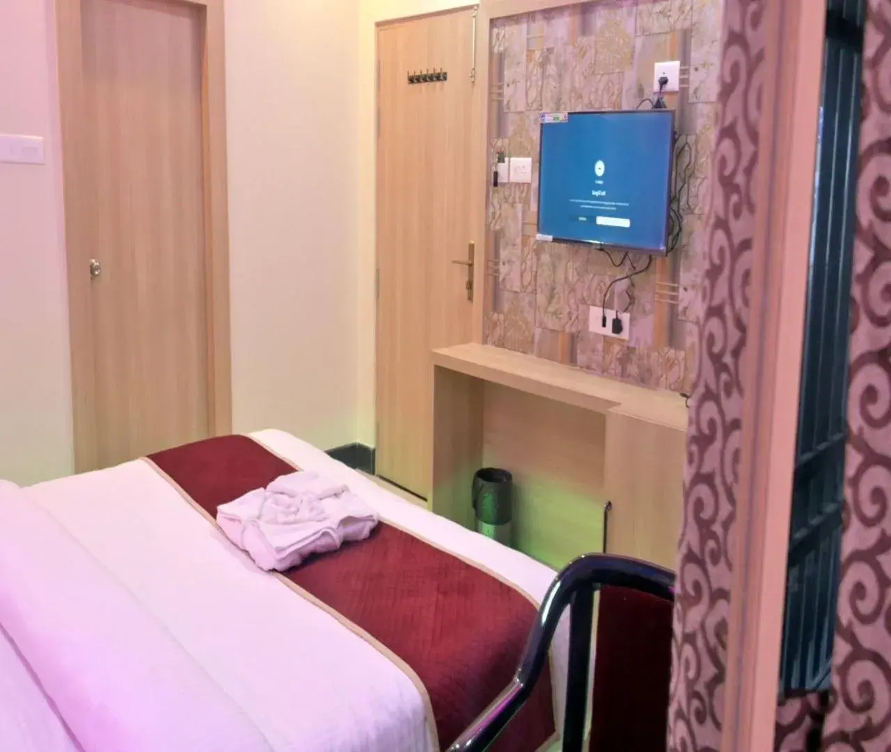 Bed in Hotel Shankara Residency Bed in Hotel Shankara Residency