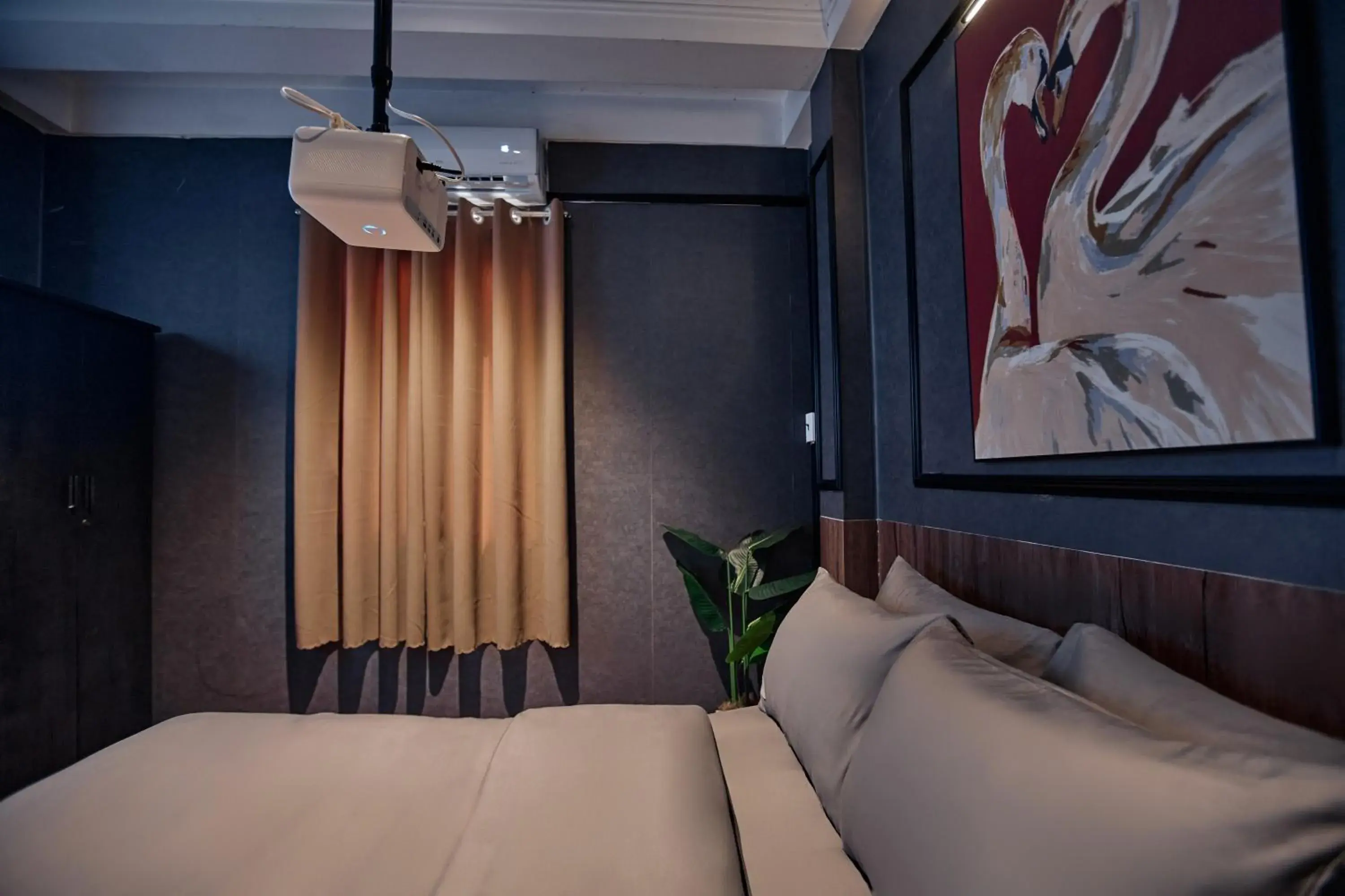 Communal lounge/ TV room, Bed in MG Rosé Boutique Hotel Communal lounge/ TV room, Bed in MG Rosé Boutique Hotel