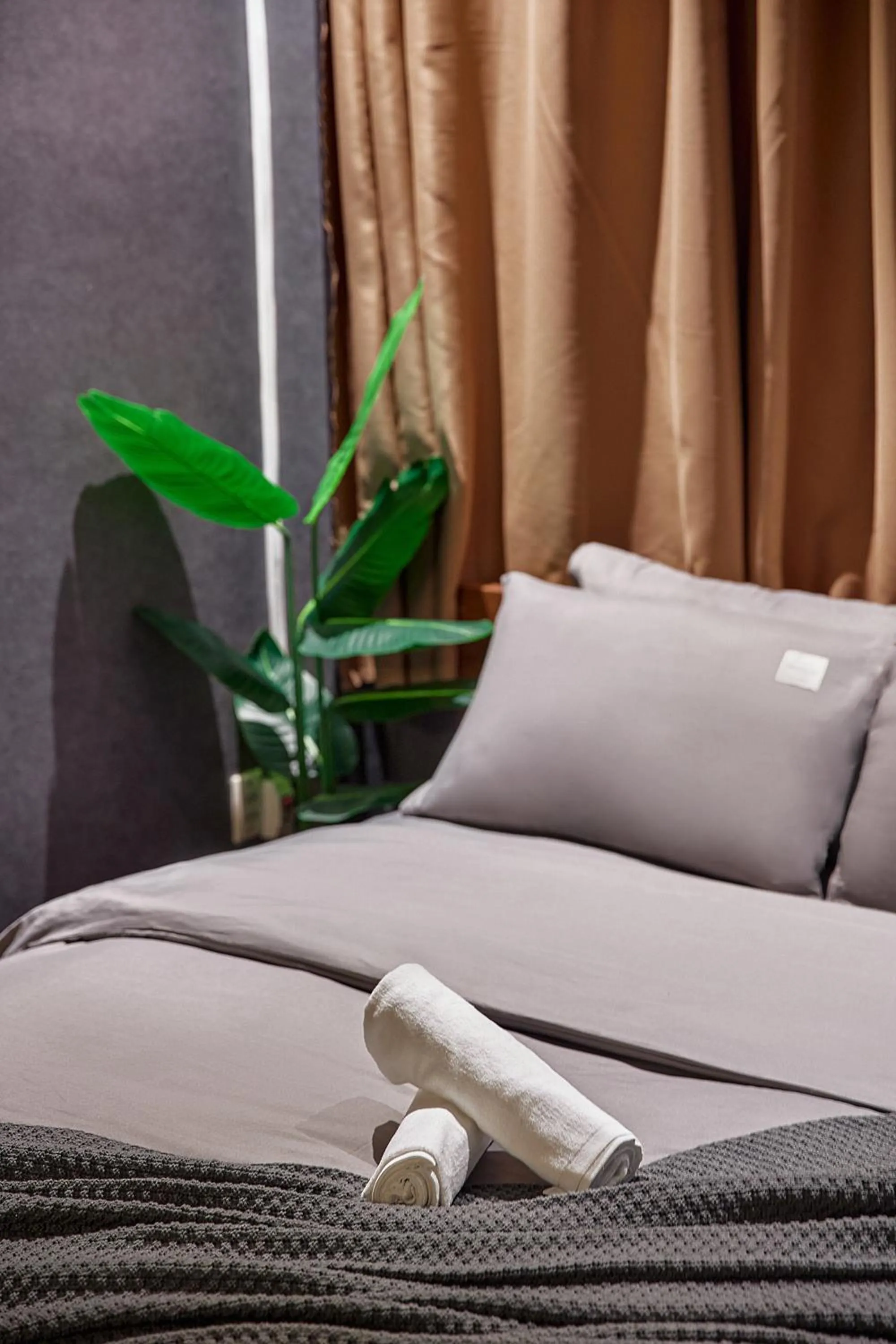 Bed in MG Rosé Boutique Hotel