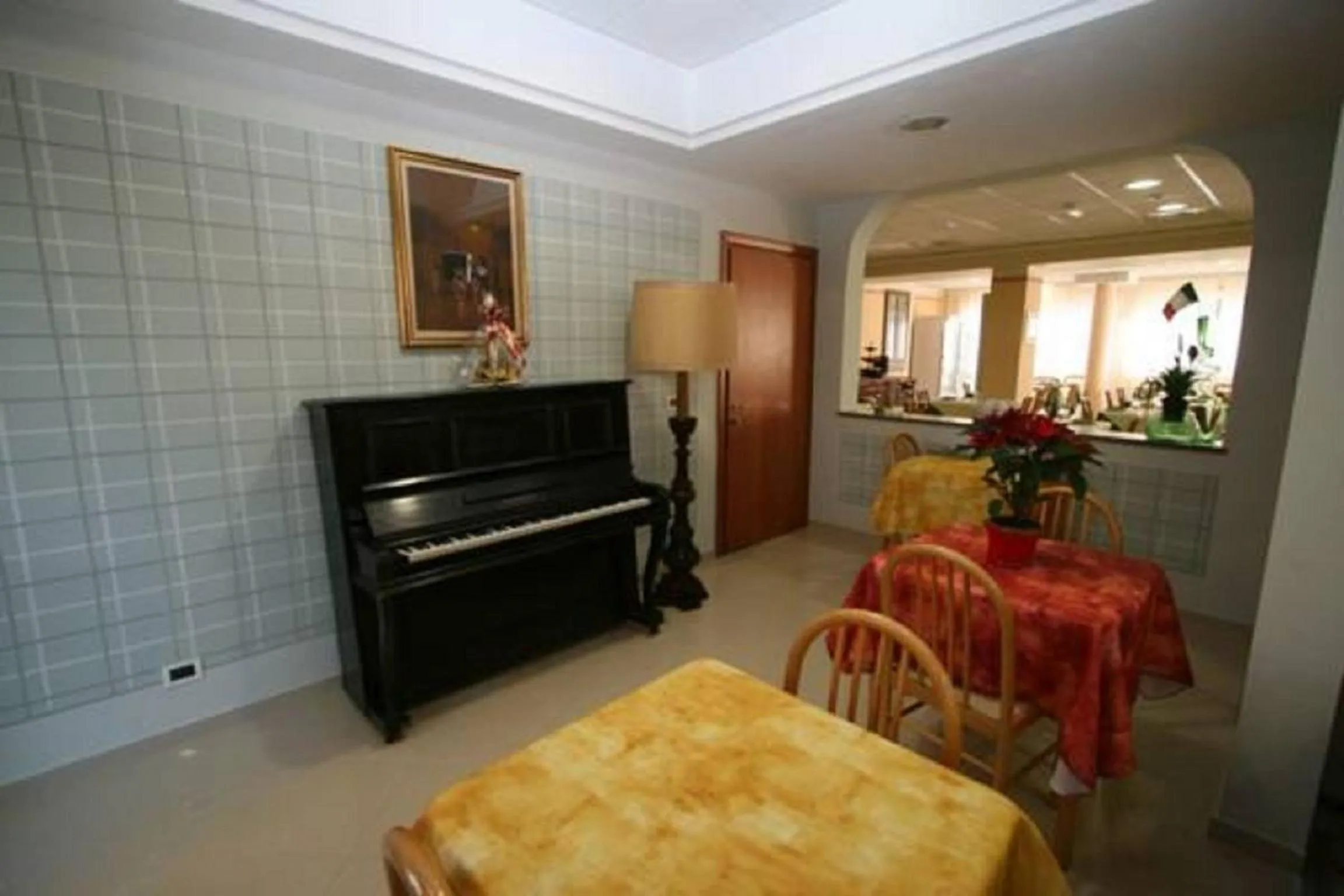 Communal lounge/ TV room in Albergo Villa Ada