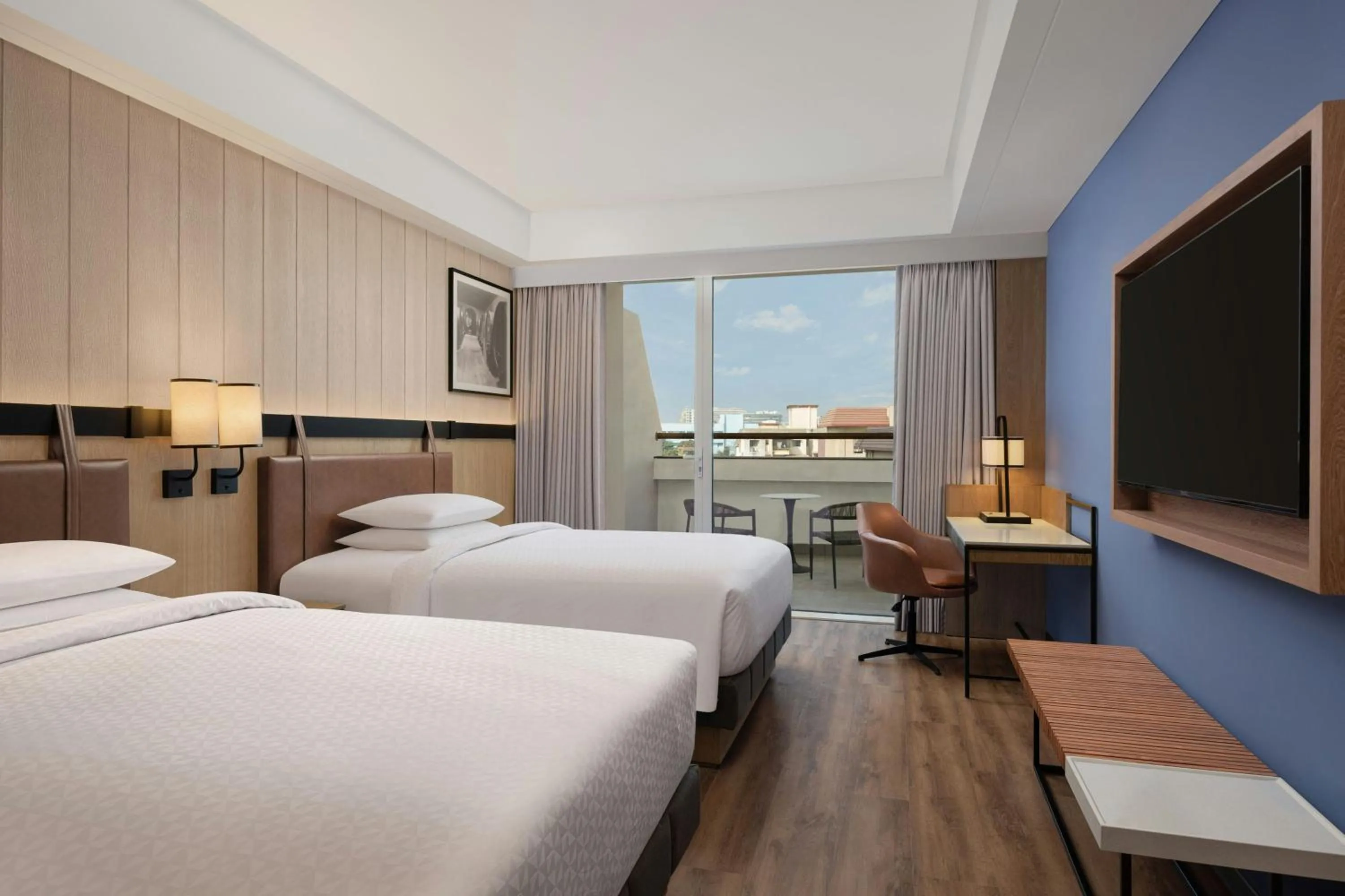 Photo of the whole room, Bed in Four Points by Sheraton Nashik