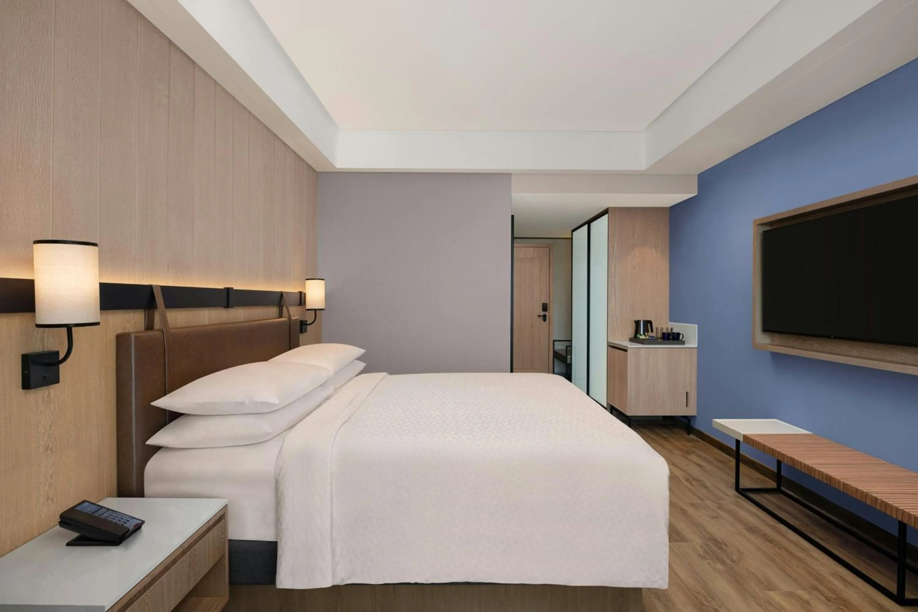 Photo of the whole room, Bed in Four Points by Sheraton Nashik