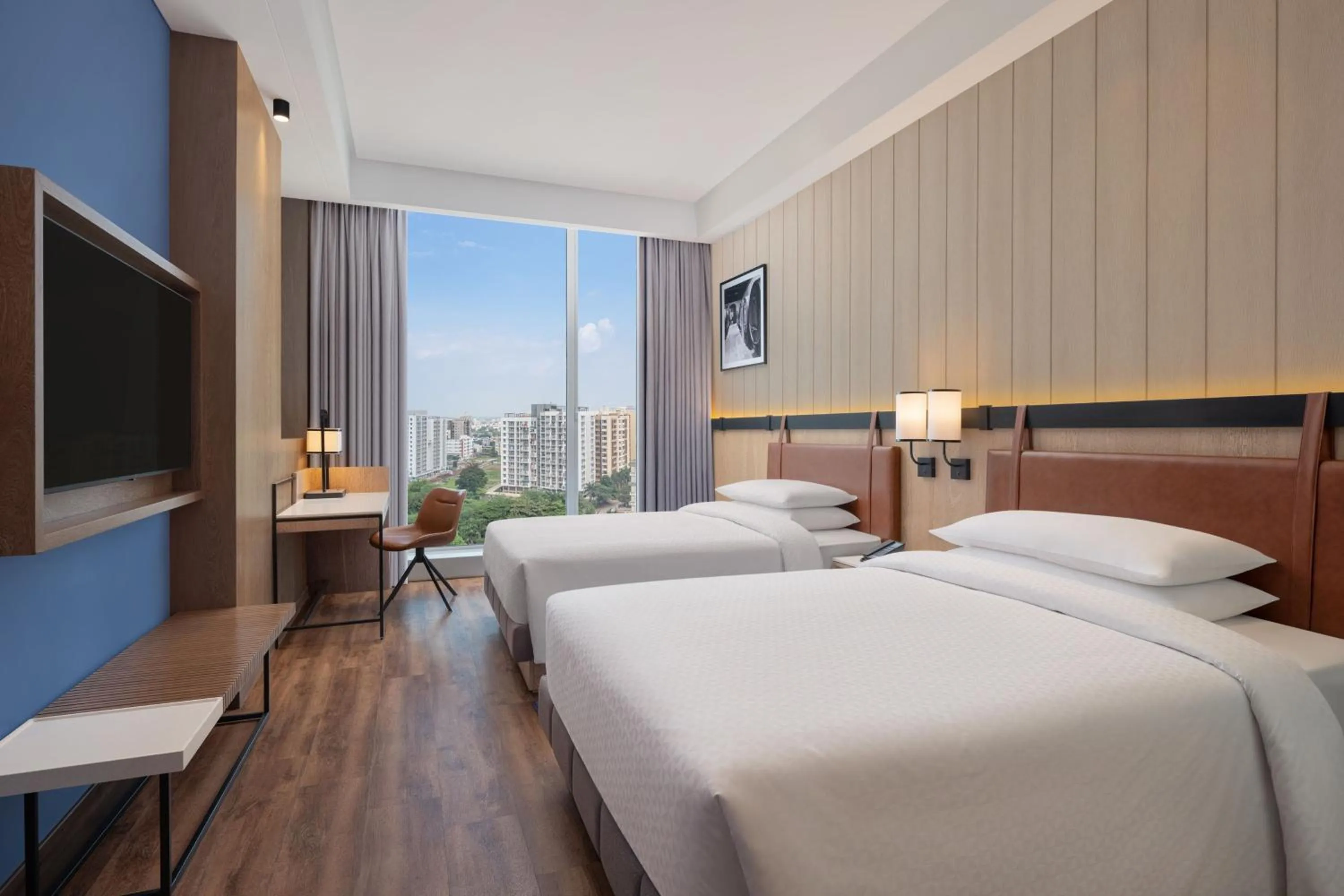 Photo of the whole room, Bed in Four Points by Sheraton Nashik