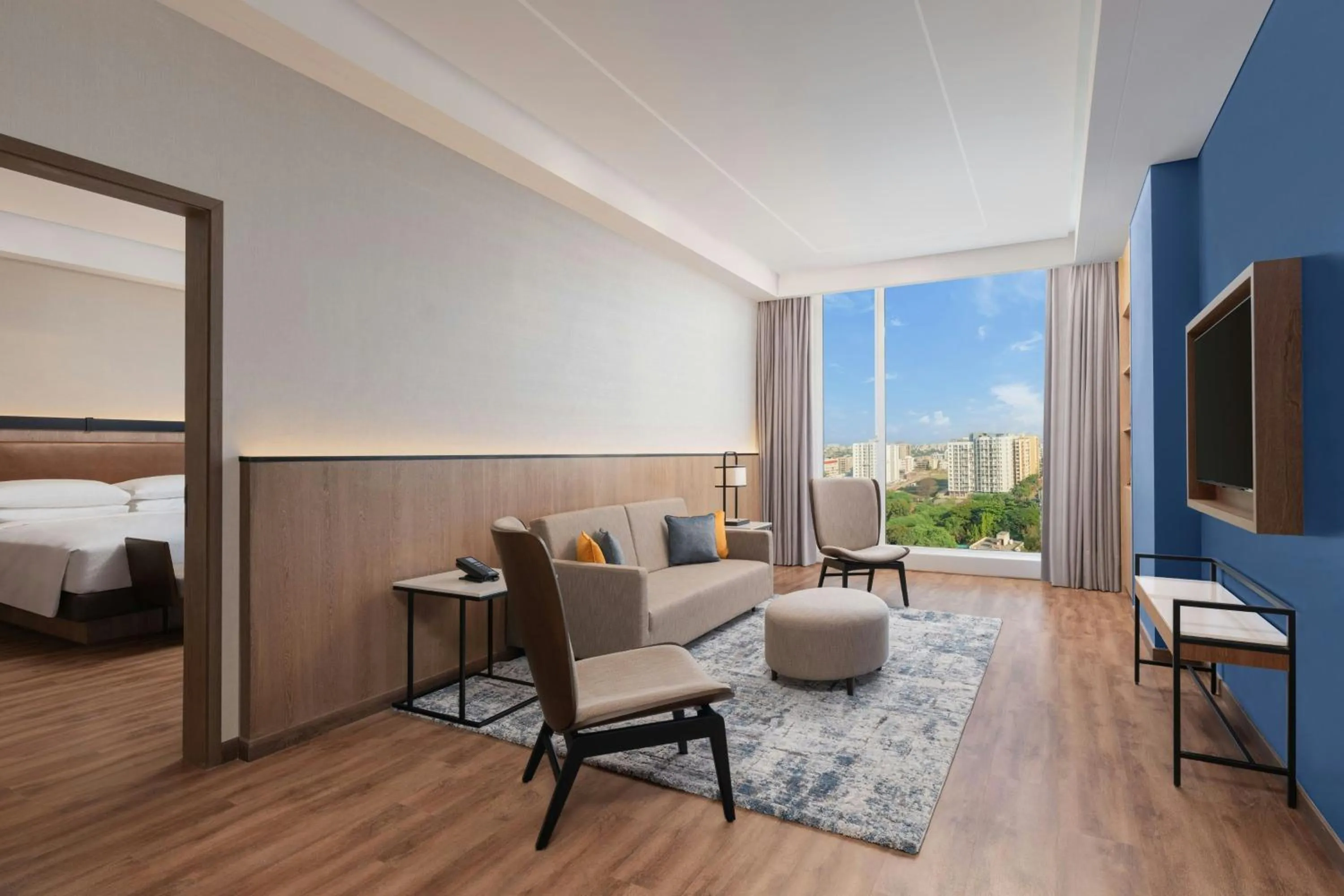 Living room, Bed in Four Points by Sheraton Nashik