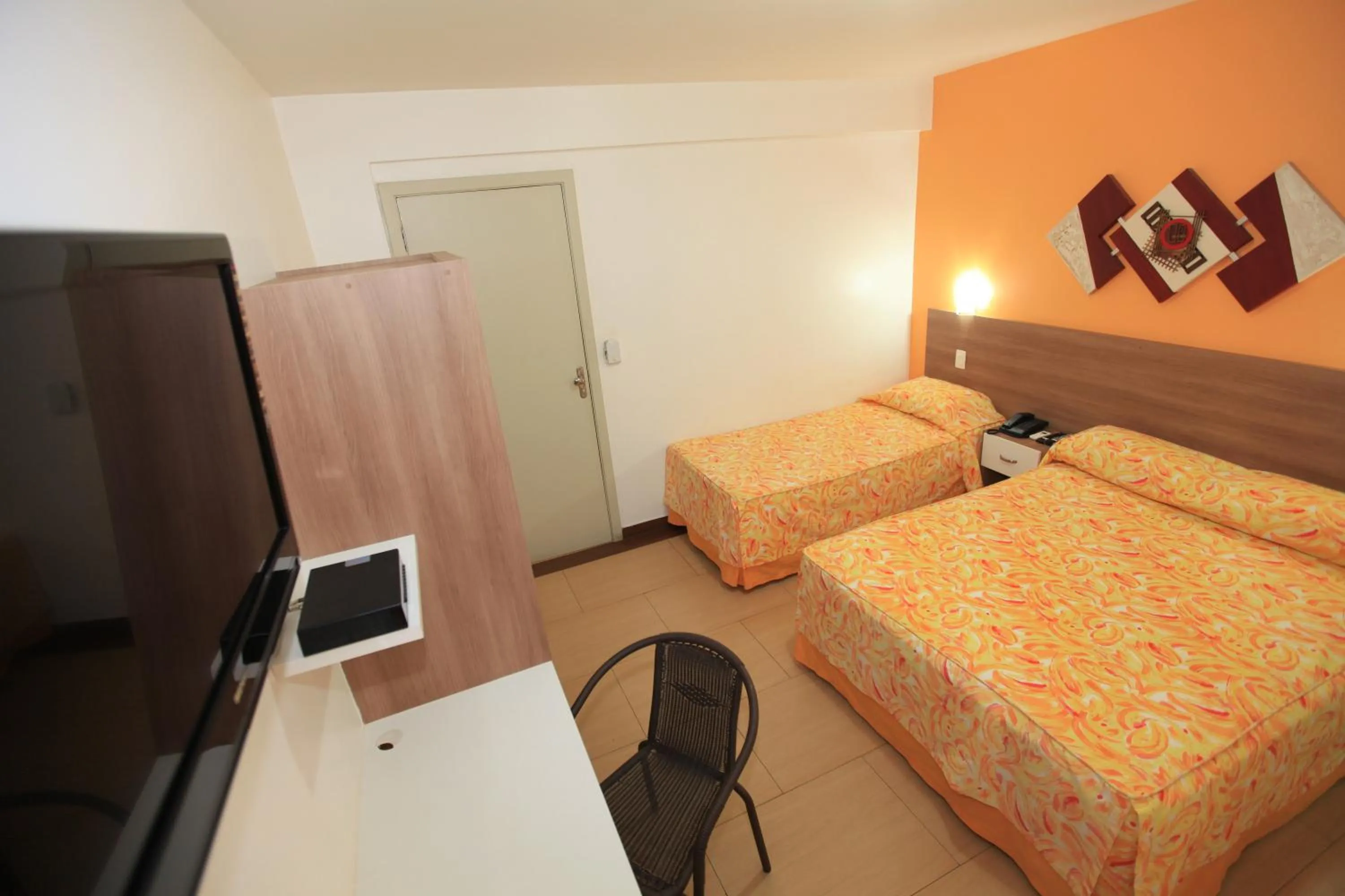 Bed in Hotel Oly Plaza