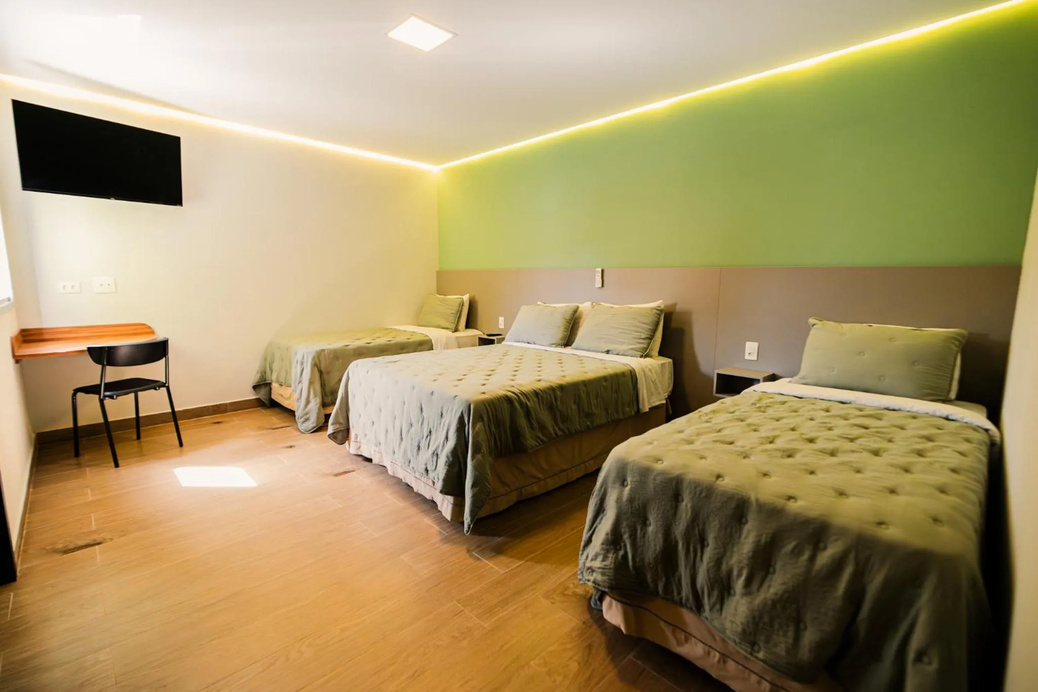 Bed in Hotel Oly Plaza