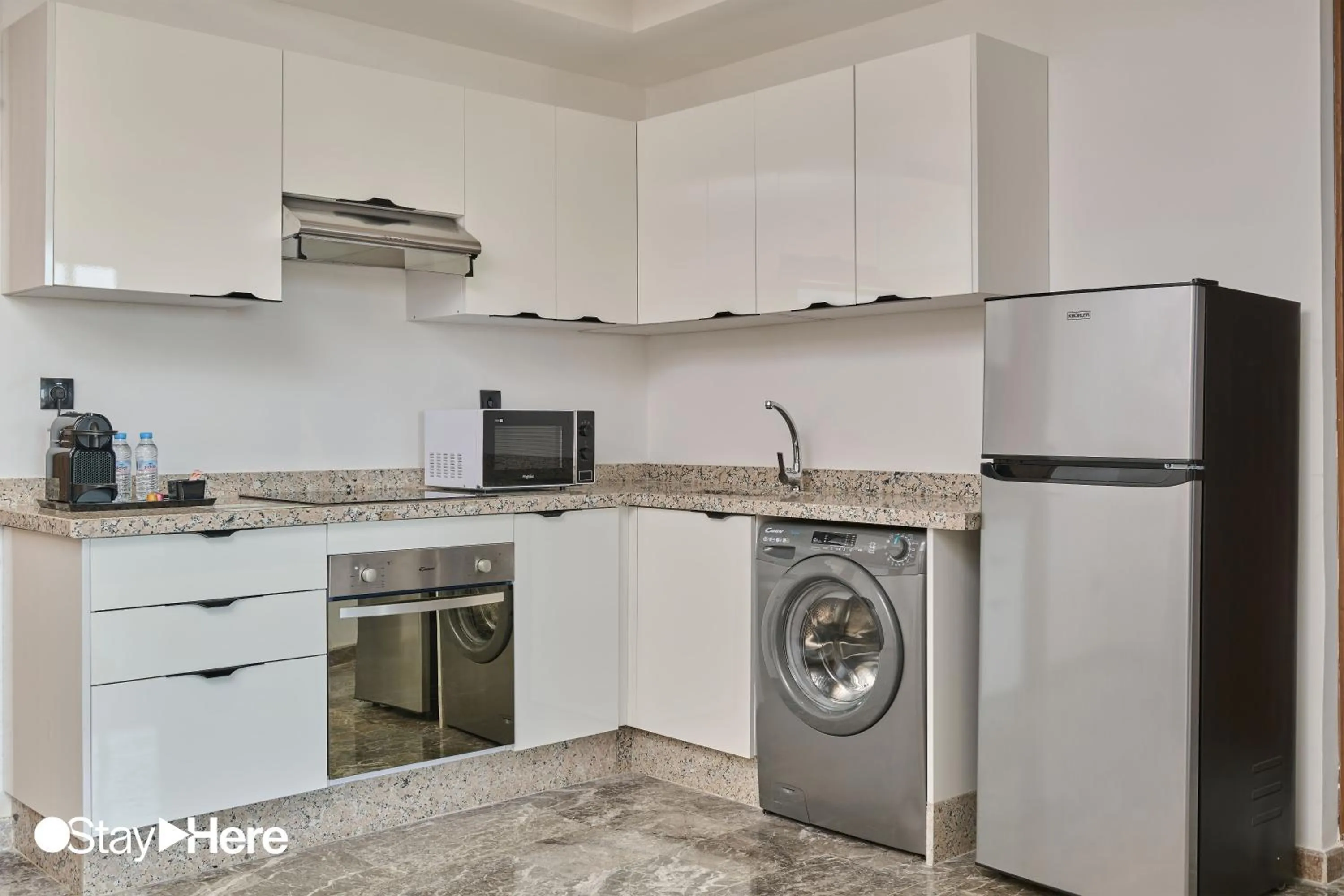 Kitchen or kitchenette in StayHere Casablanca - Oasis - Premium Residence