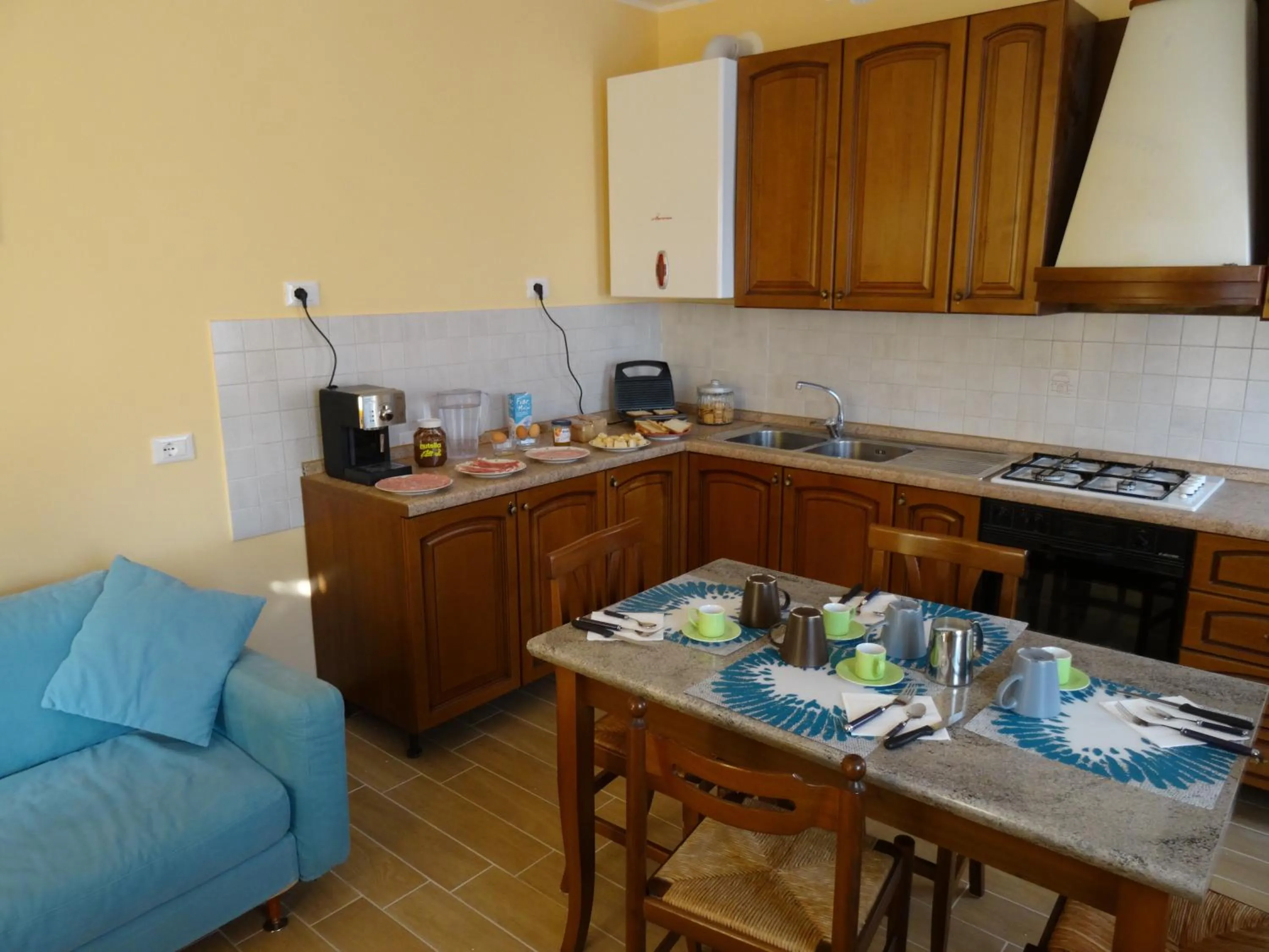 Kitchen or kitchenette in B&B Giardino di Ro
