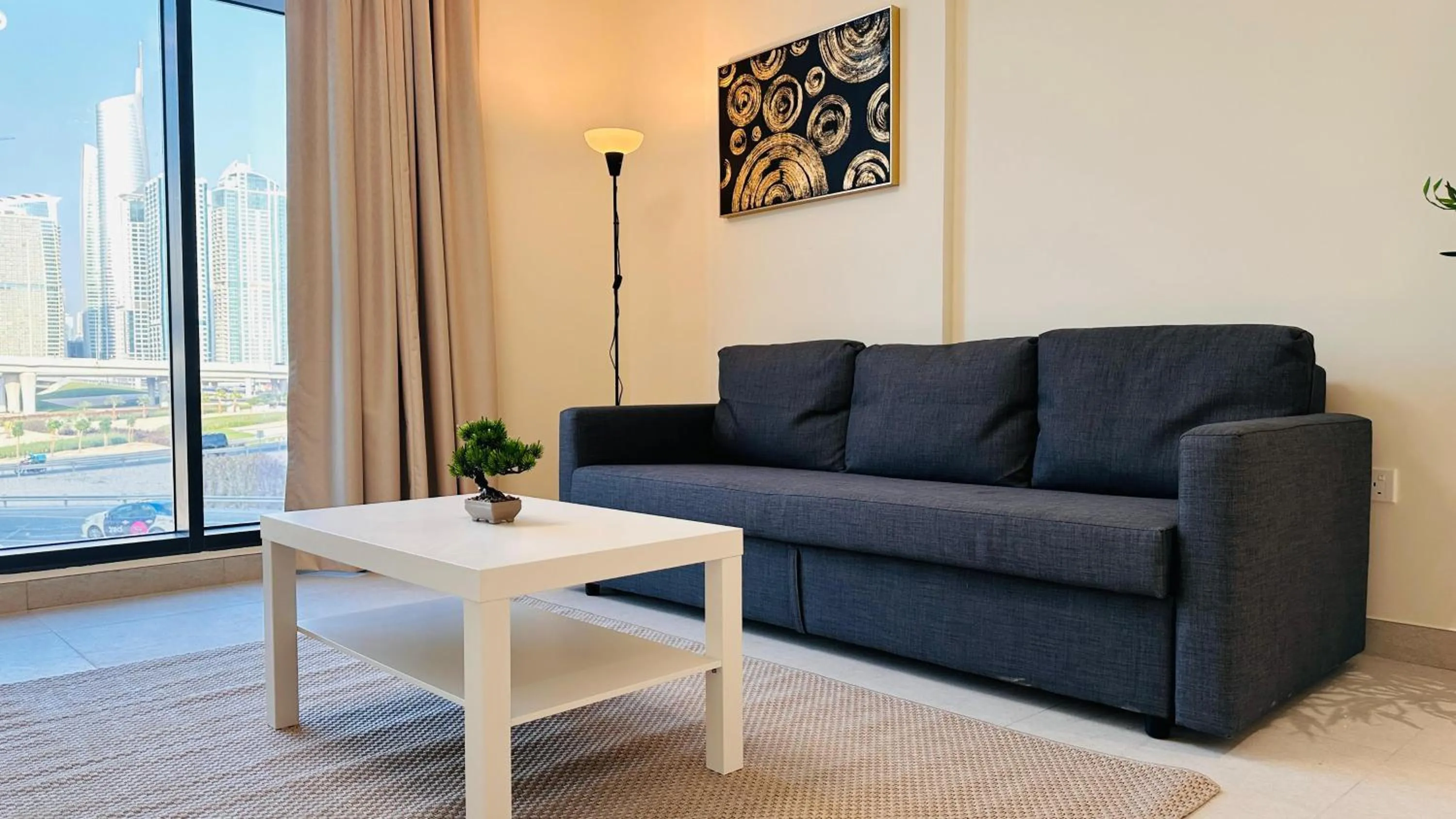 Seating area in Sunday Sheikh Zayed Road Concord Tower by Belvilla