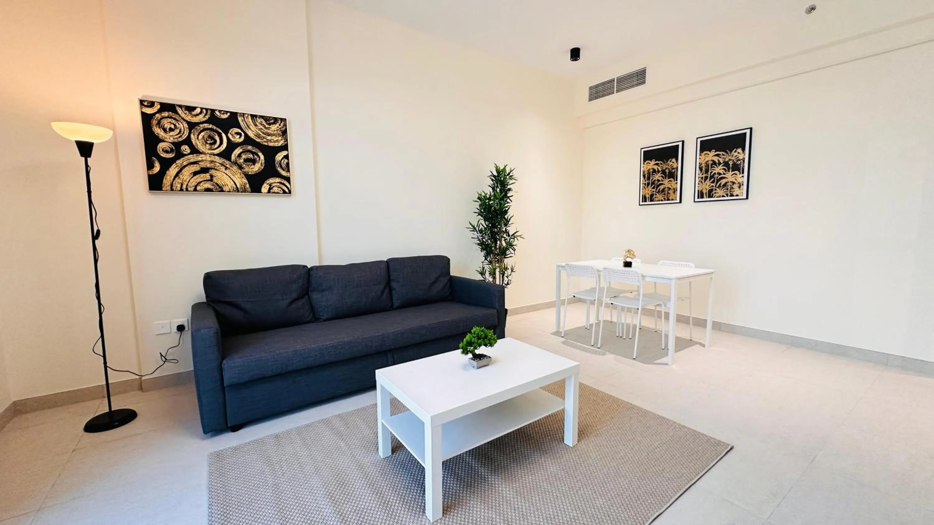 Seating area in Sunday Sheikh Zayed Road Concord Tower by Belvilla