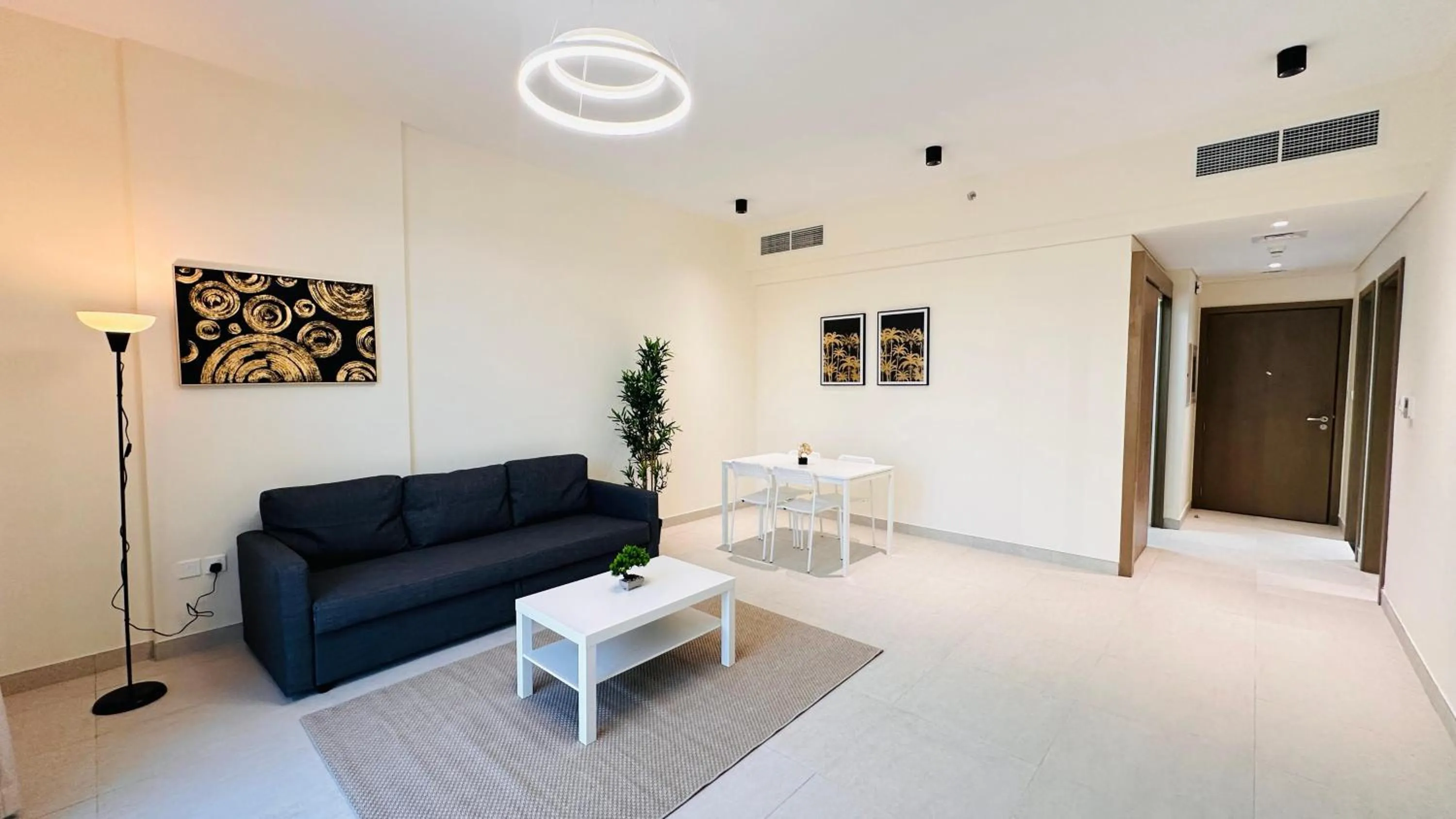 Seating area in Sunday Sheikh Zayed Road Concord Tower by Belvilla