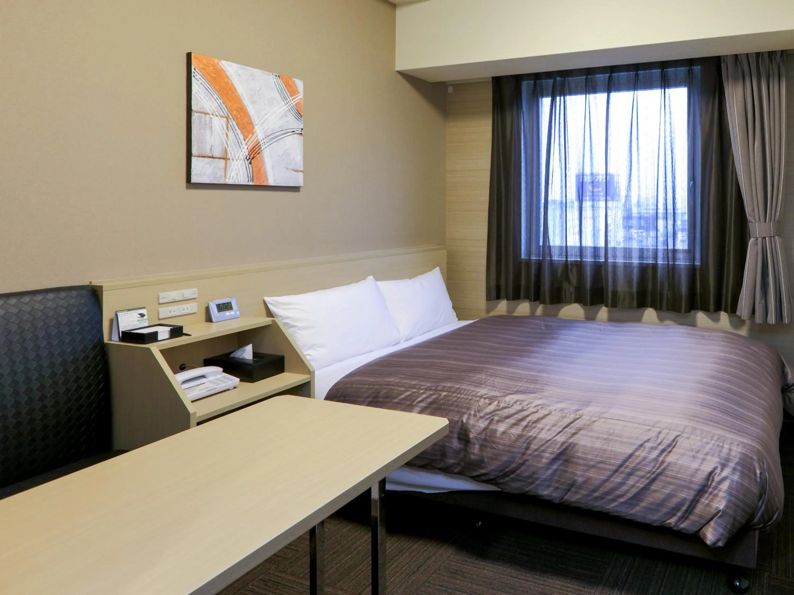 Photo of the whole room, Bed in Hotel Route Inn Hamamatsu Dealer Dori