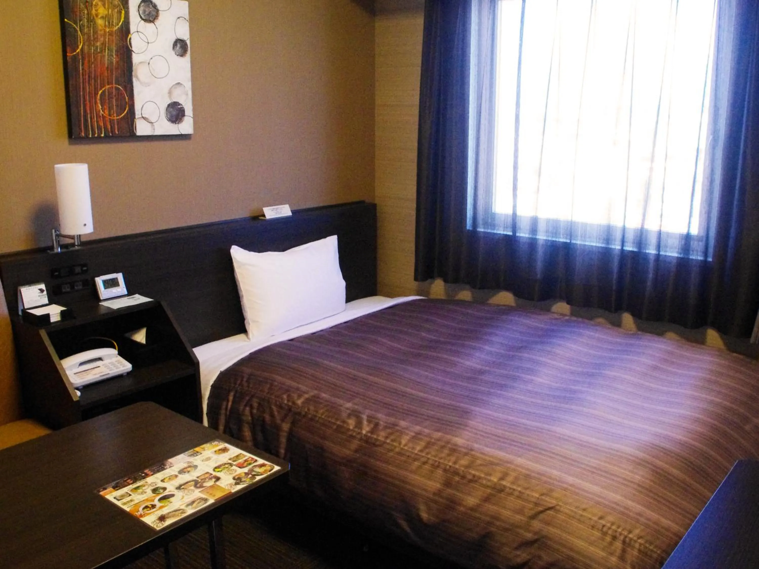 Photo of the whole room, Bed in Hotel Route Inn Hamamatsu Dealer Dori