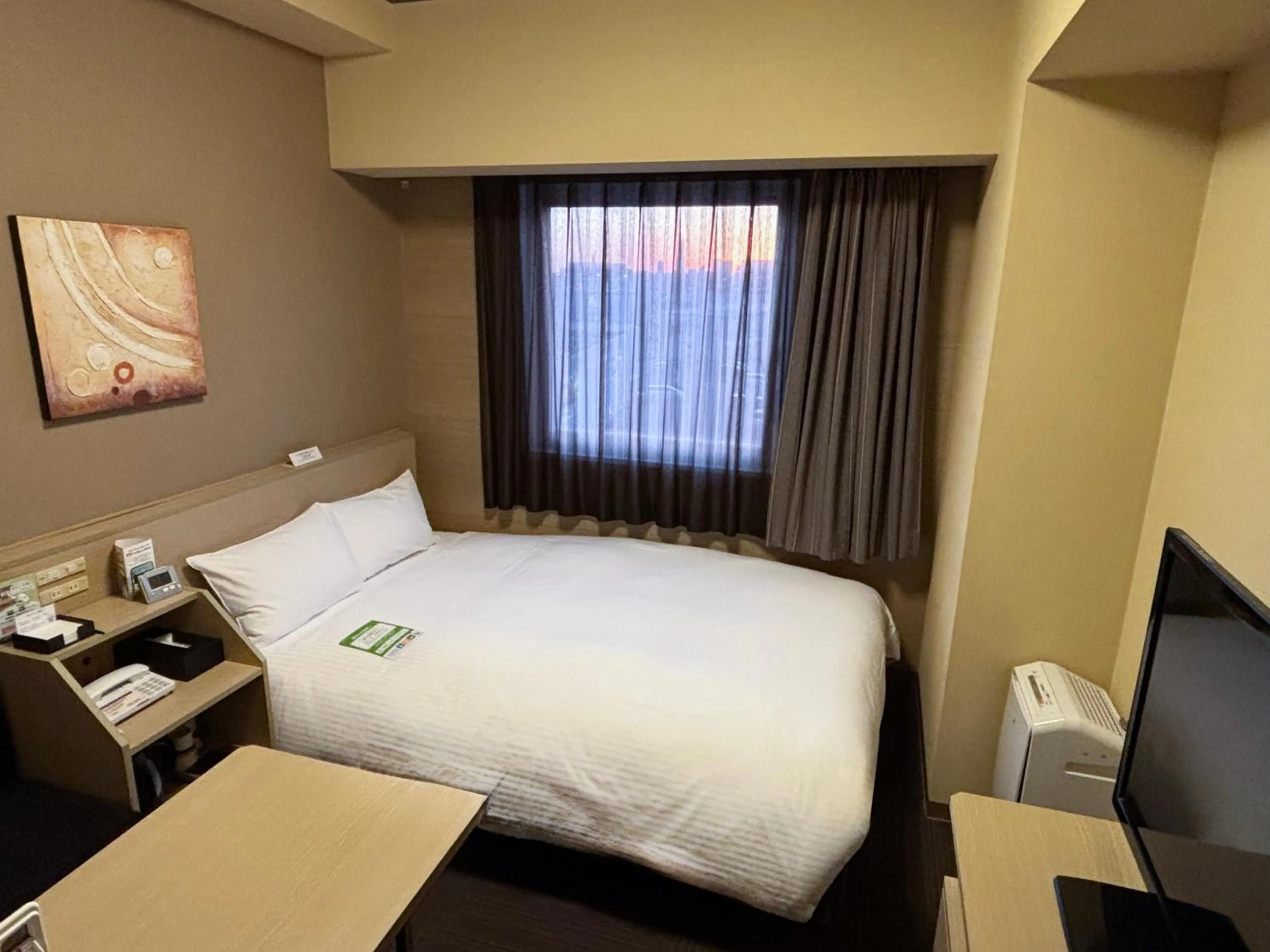 Photo of the whole room, Bed in Hotel Route Inn Hamamatsu Dealer Dori