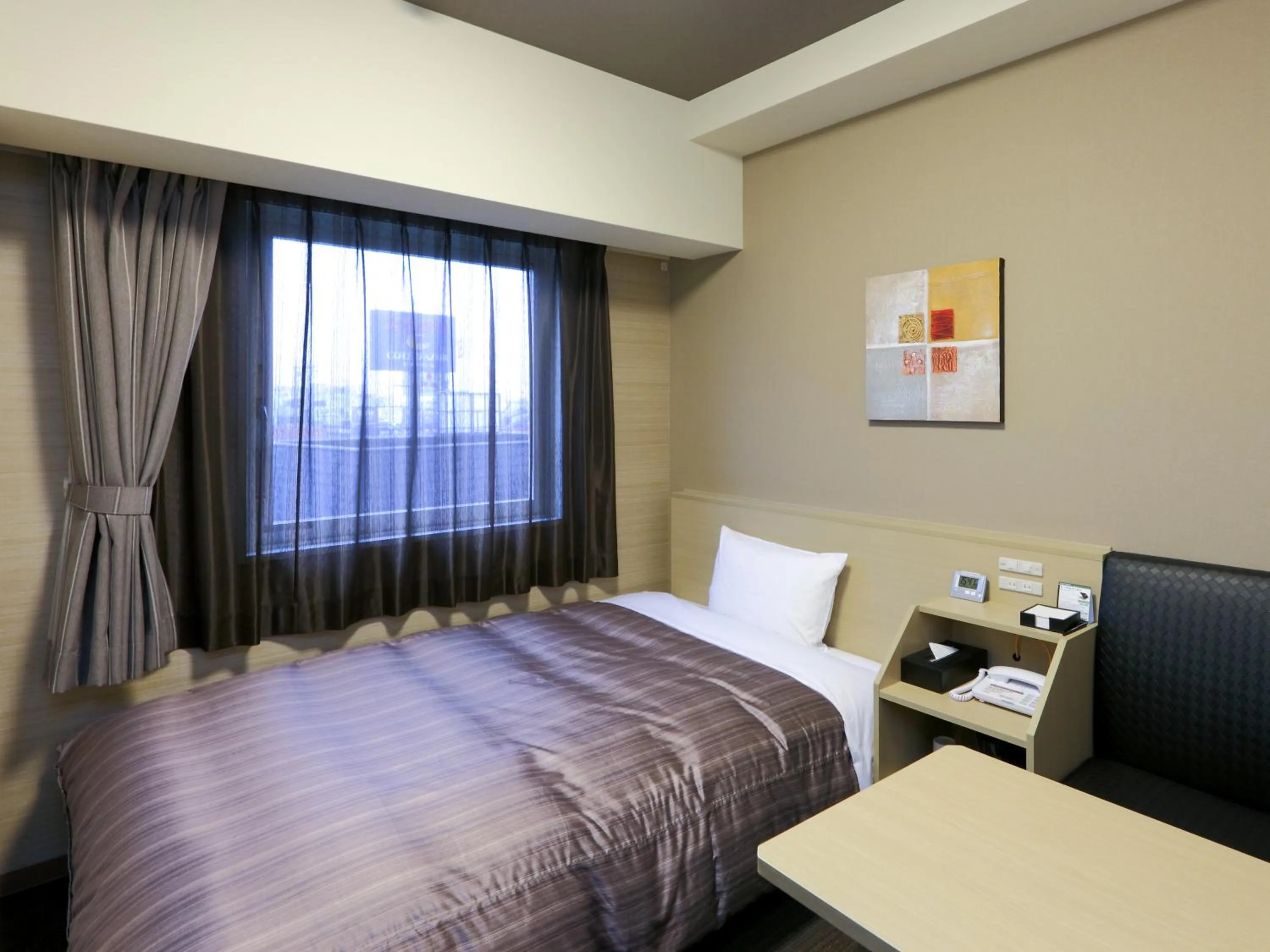 Photo of the whole room, Bed in Hotel Route Inn Hamamatsu Dealer Dori