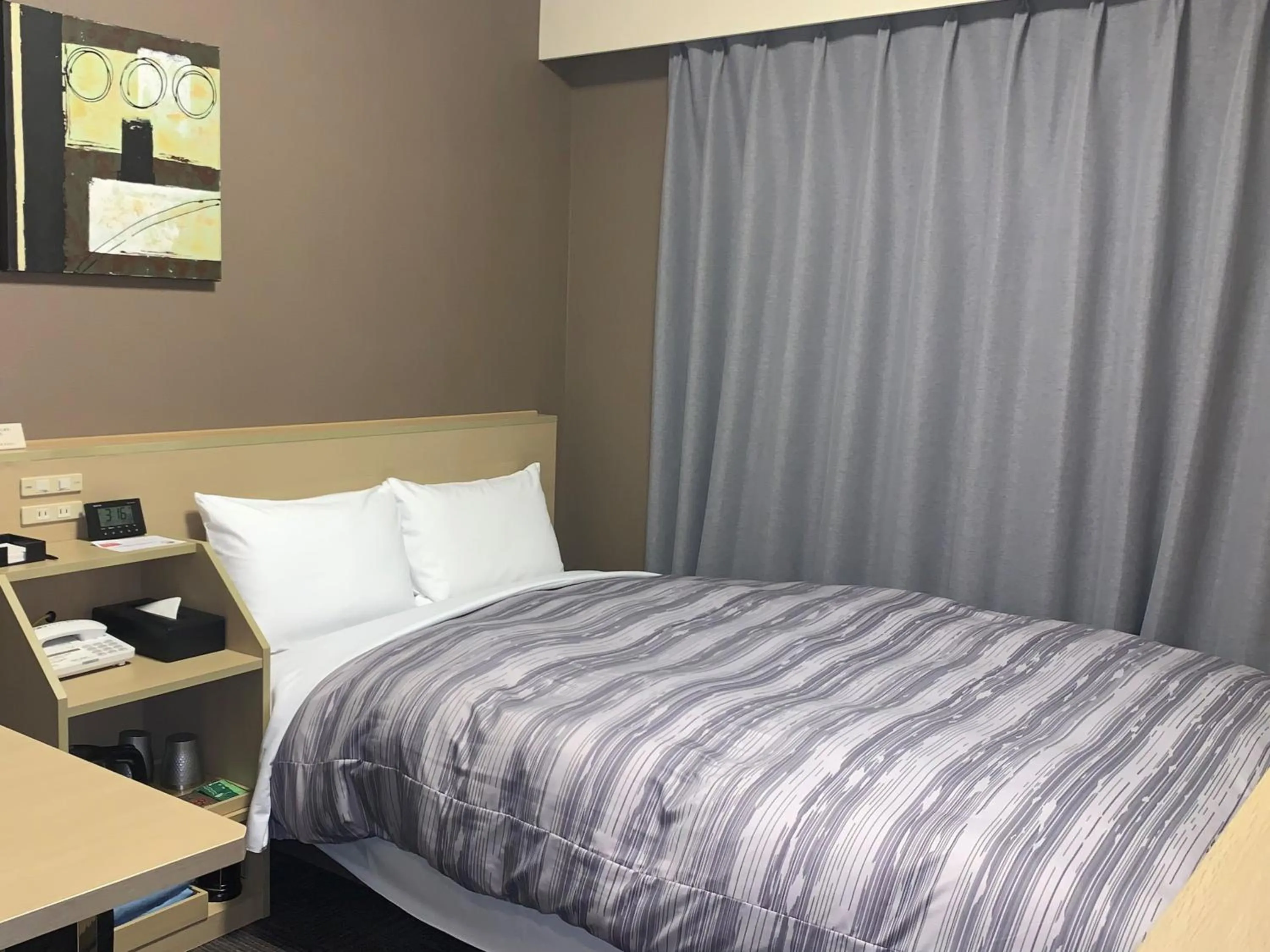 Photo of the whole room, Bed in Hotel Route Inn Hitachinaka