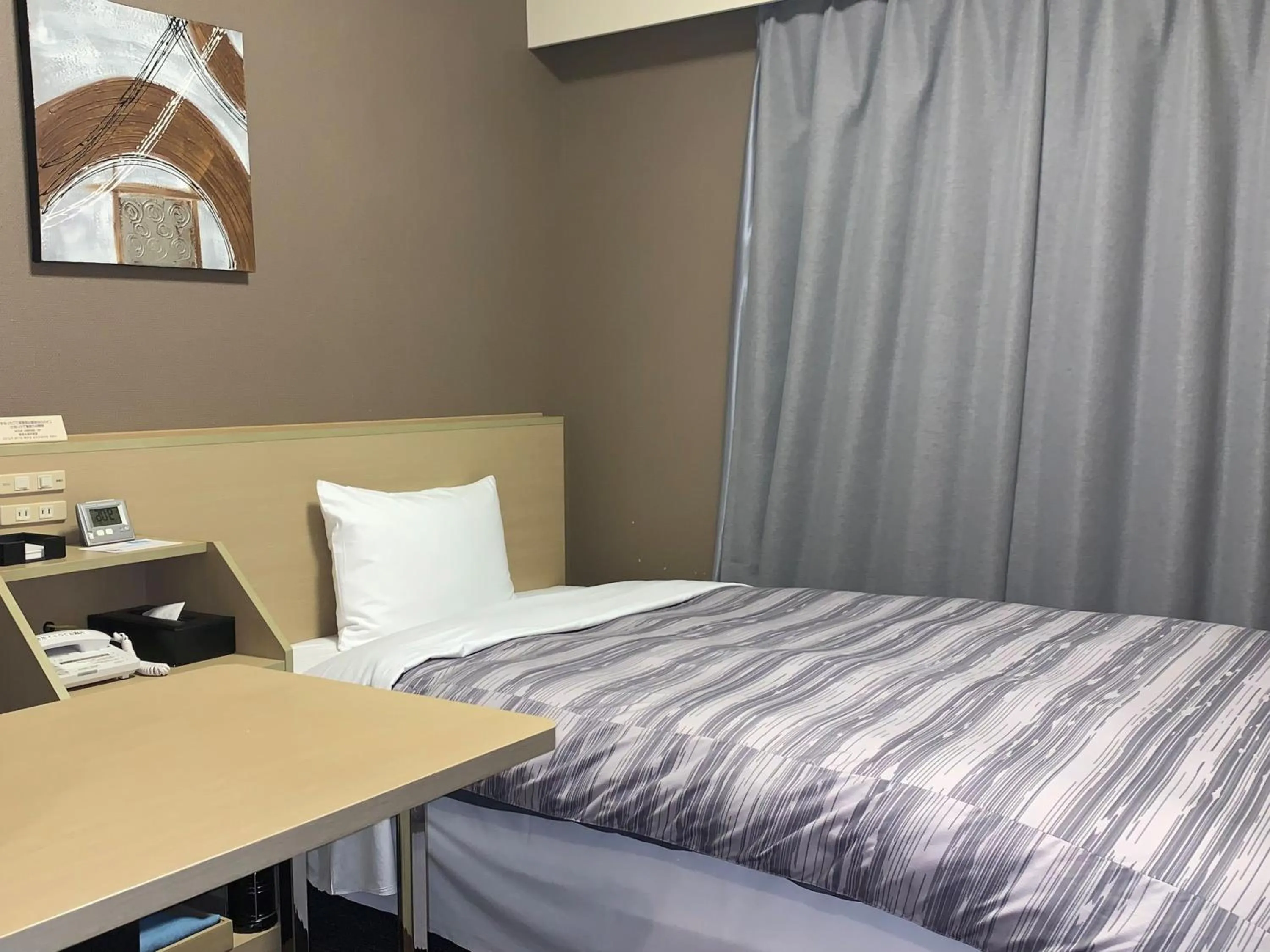 Photo of the whole room, Bed in Hotel Route Inn Hitachinaka