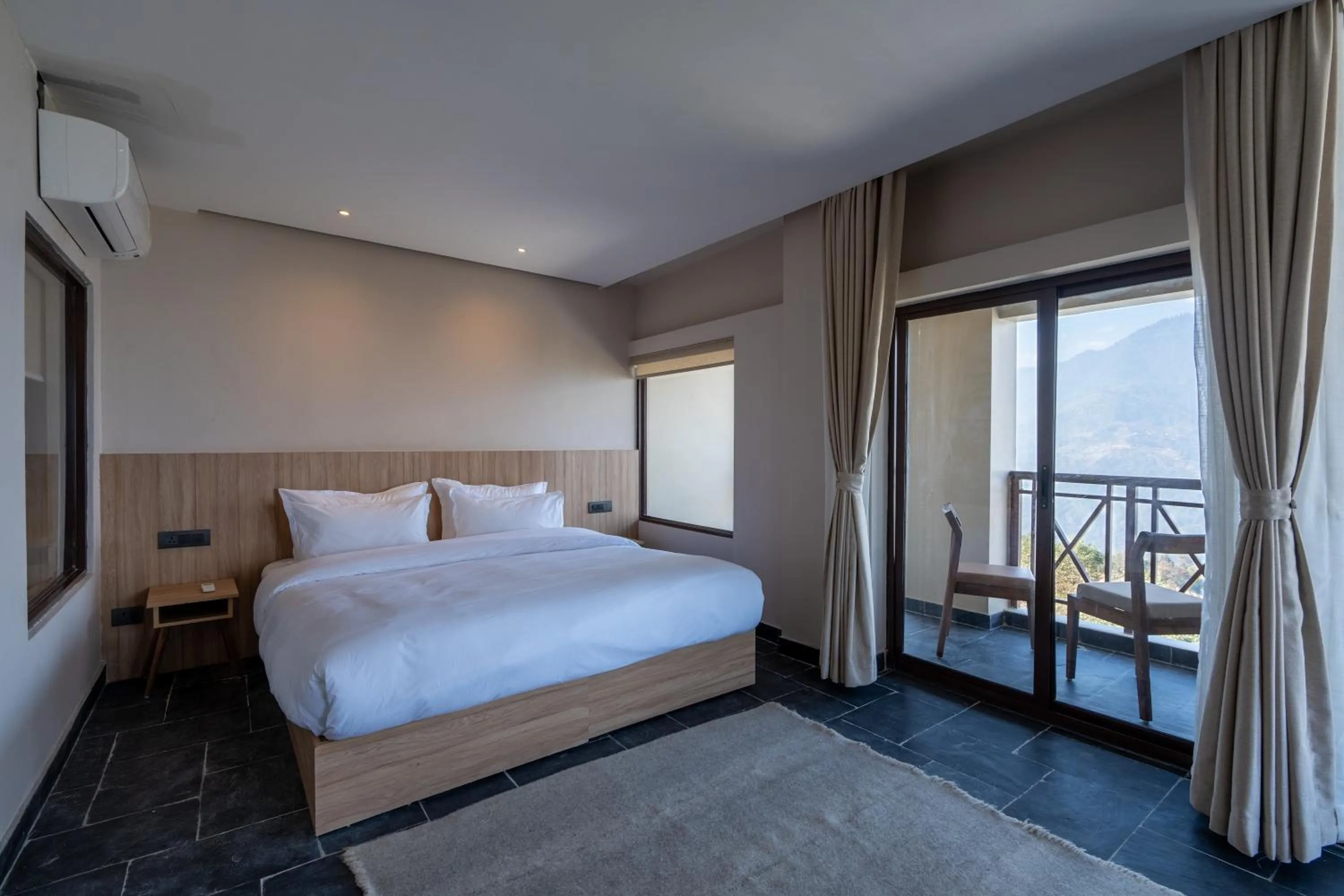 Bed in Nana Mountain Resort Mt Annapurna View