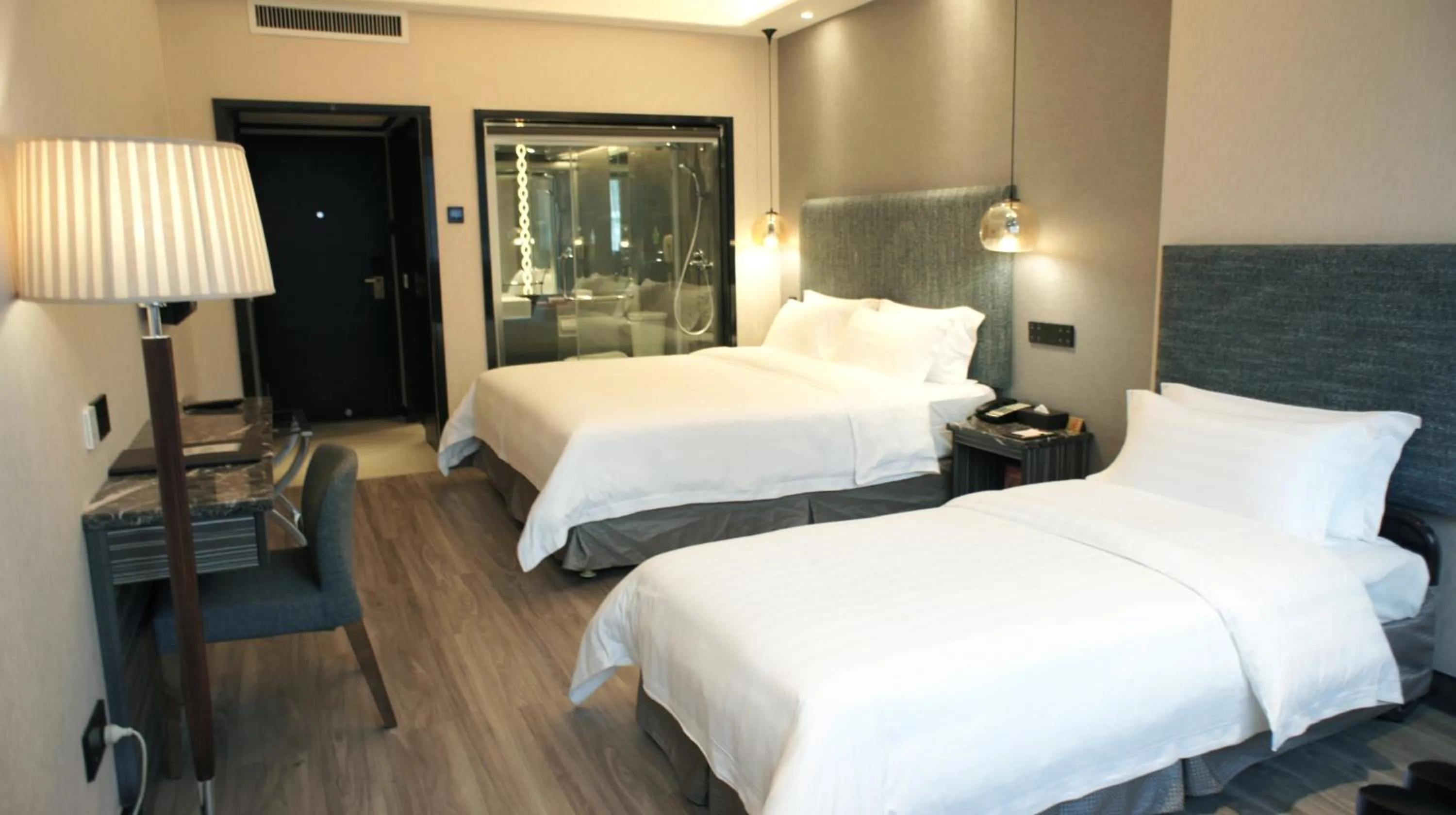 Bed in Shenzhen Lido Hotel