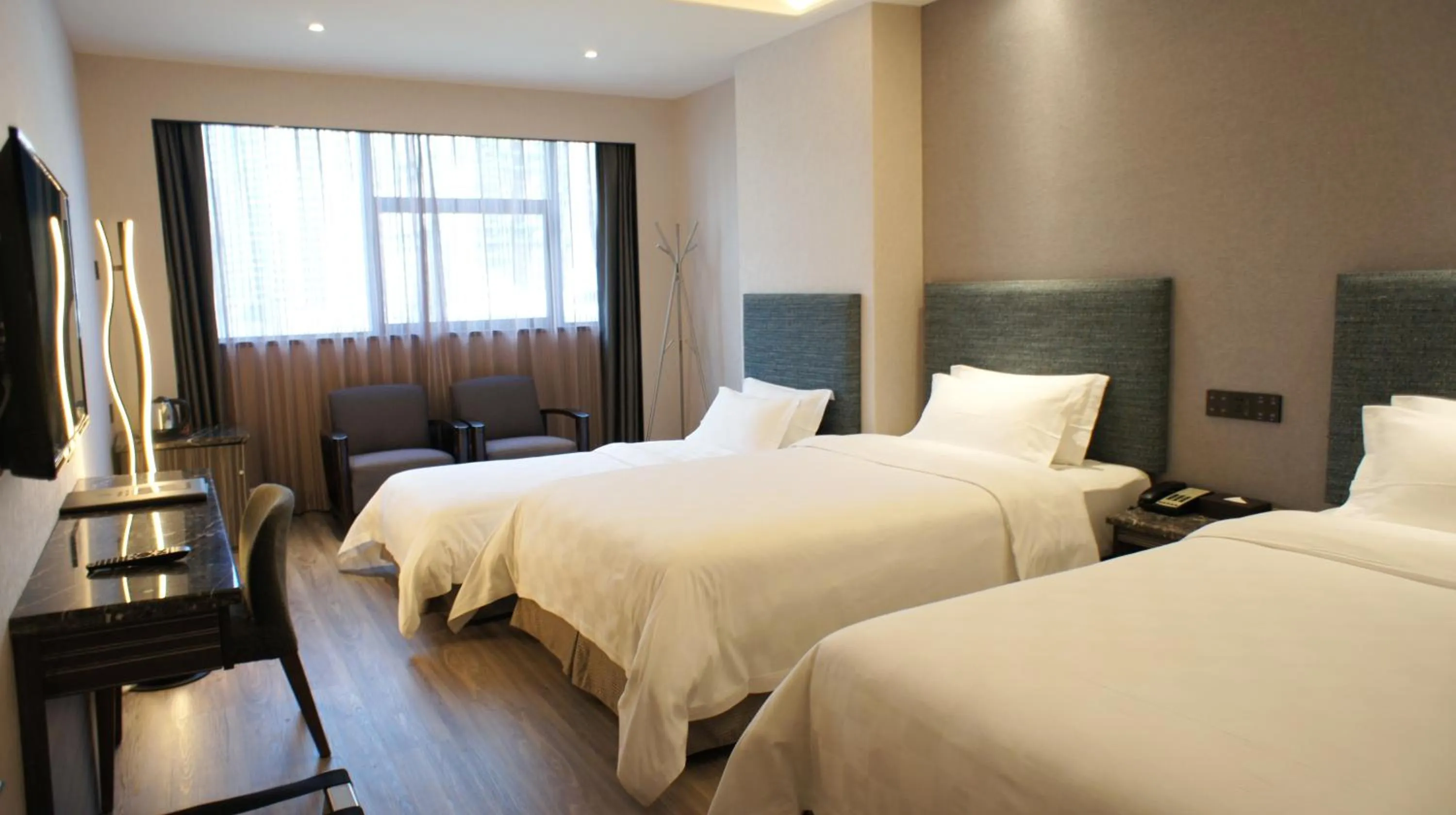 Bed in Shenzhen Lido Hotel