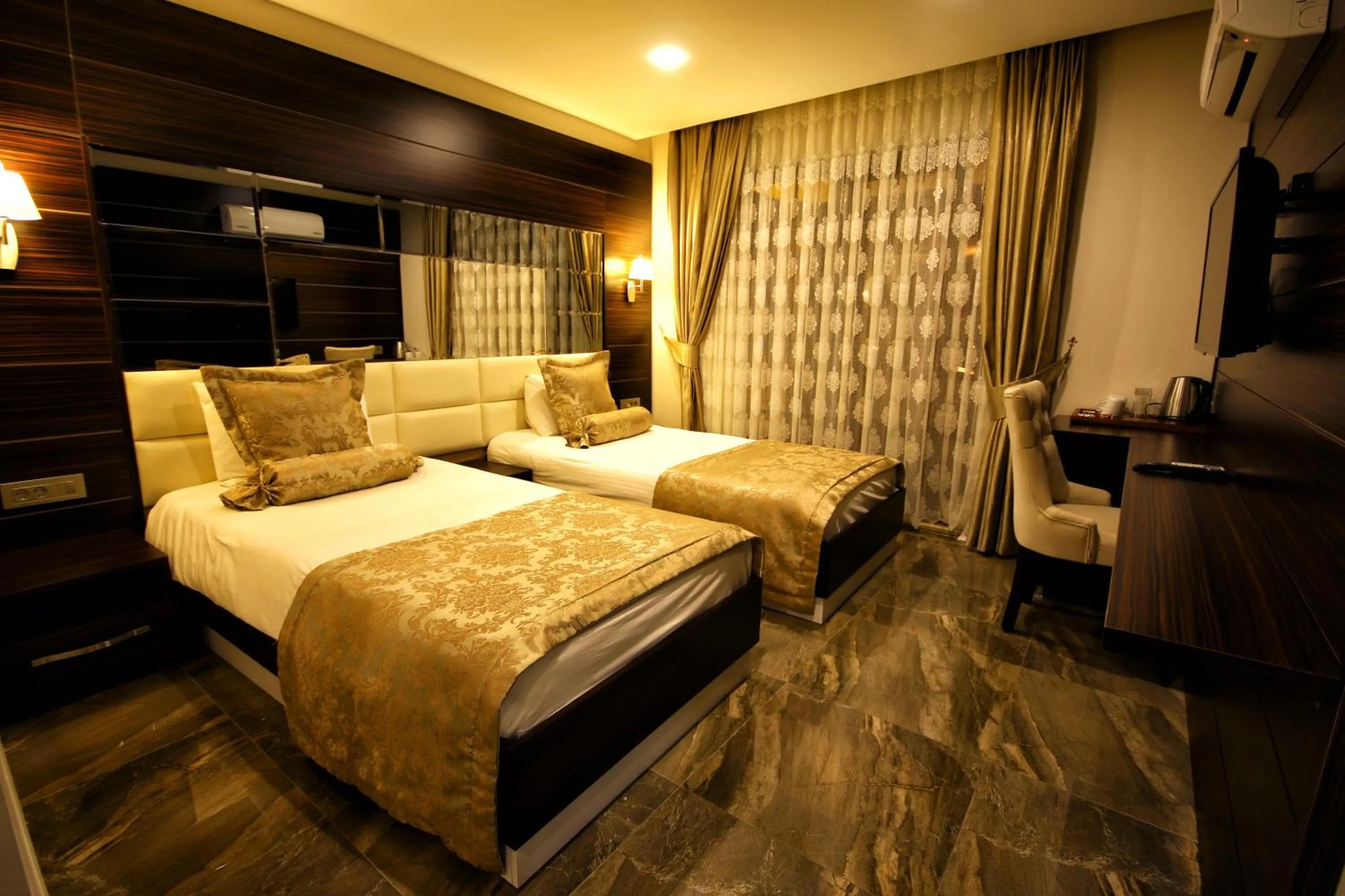 Photo of the whole room, Bed in Venus Suite Hotel