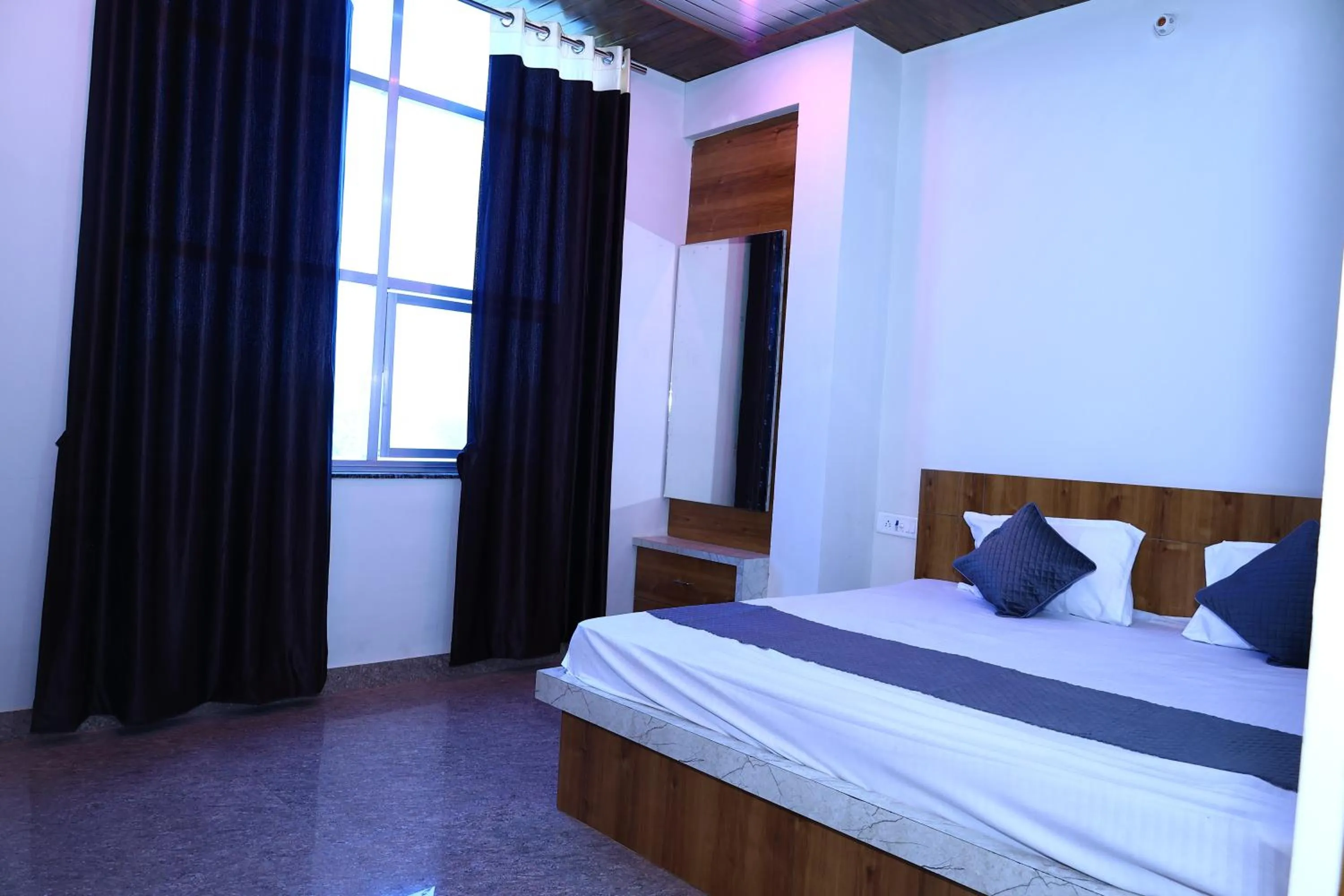 Bed in Hotel SHIV SHAKTI PALACE