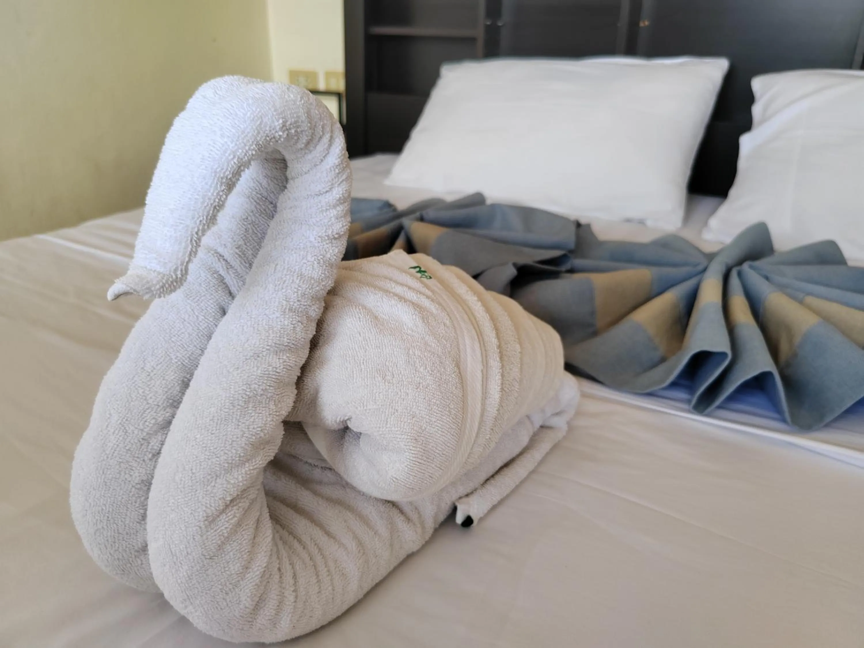towels, Bed in L&K2023 Residence
