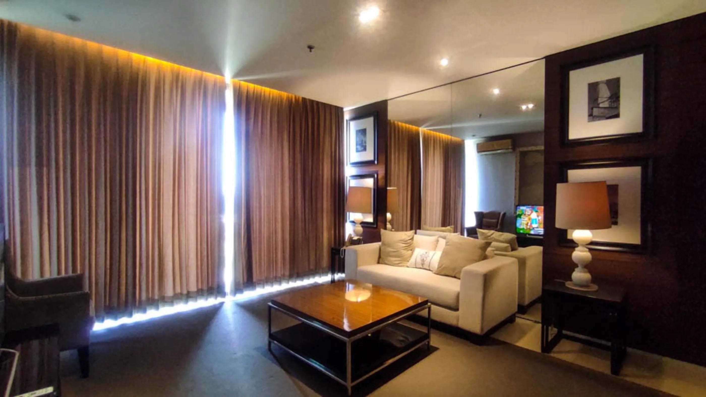 Living room, Bed in Apartment 3BR with River View in City Center at Sumatra36 Surabaya By Travelio