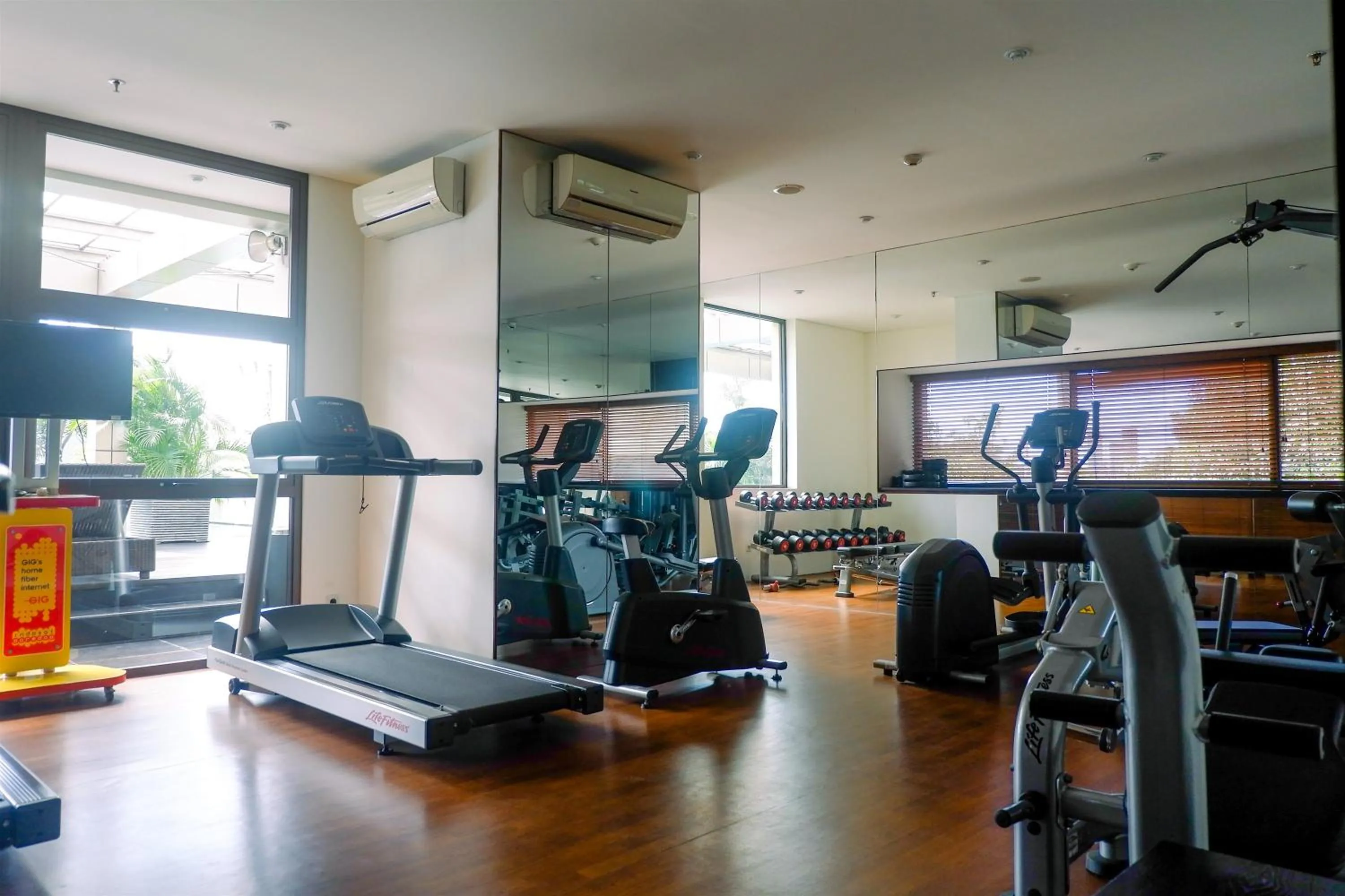 Fitness centre/facilities in Apartment 3BR with River View in City Center at Sumatra36 Surabaya By Travelio