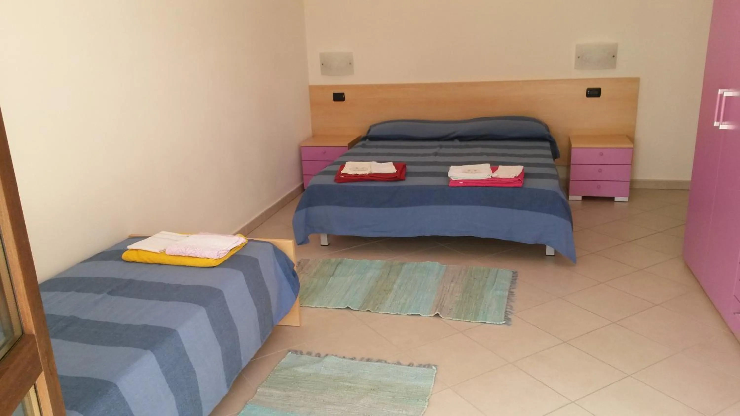 Bed in Appartamenti Elisa