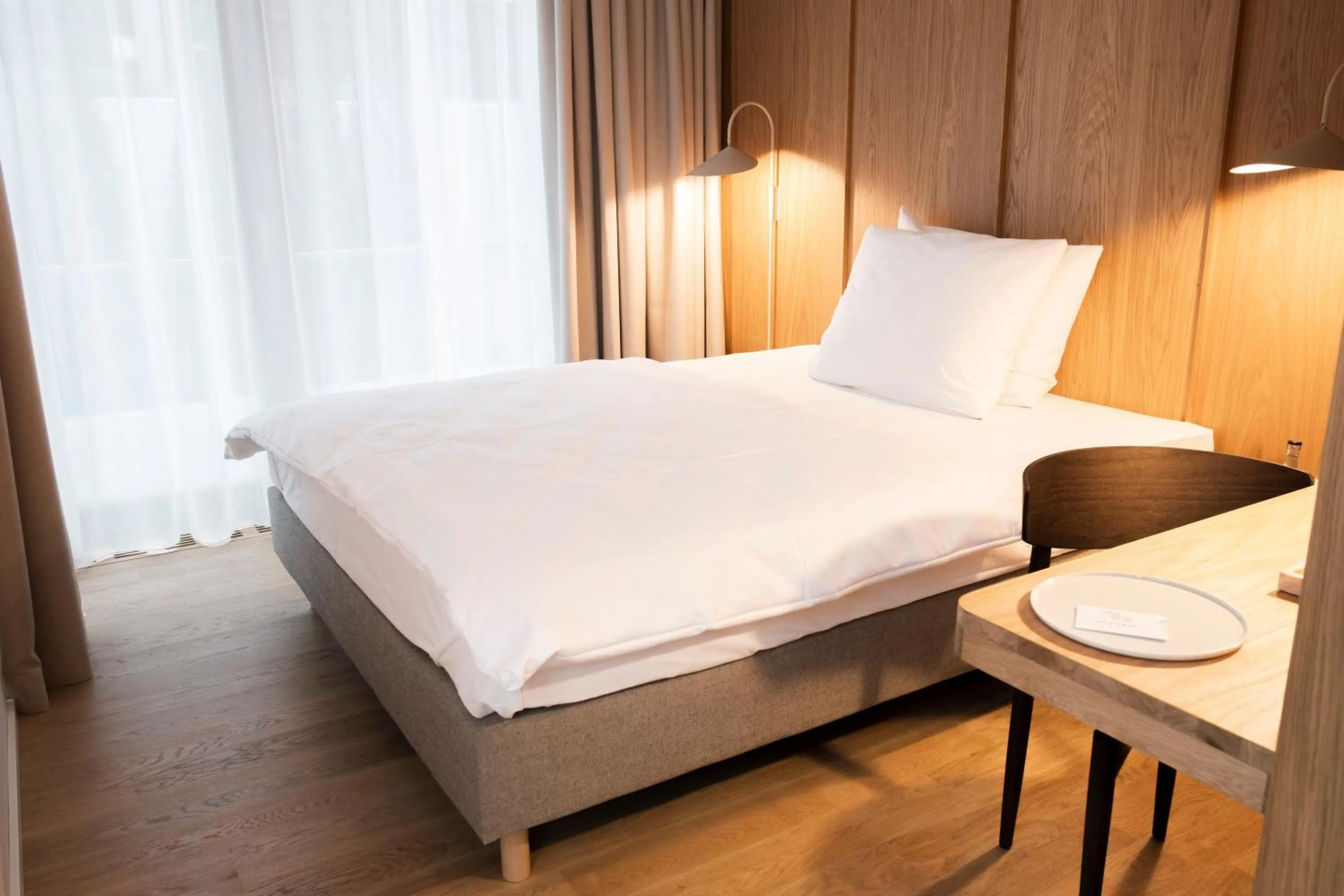 Bed in Das Kaya Hotel Stuttgart Airport Messe