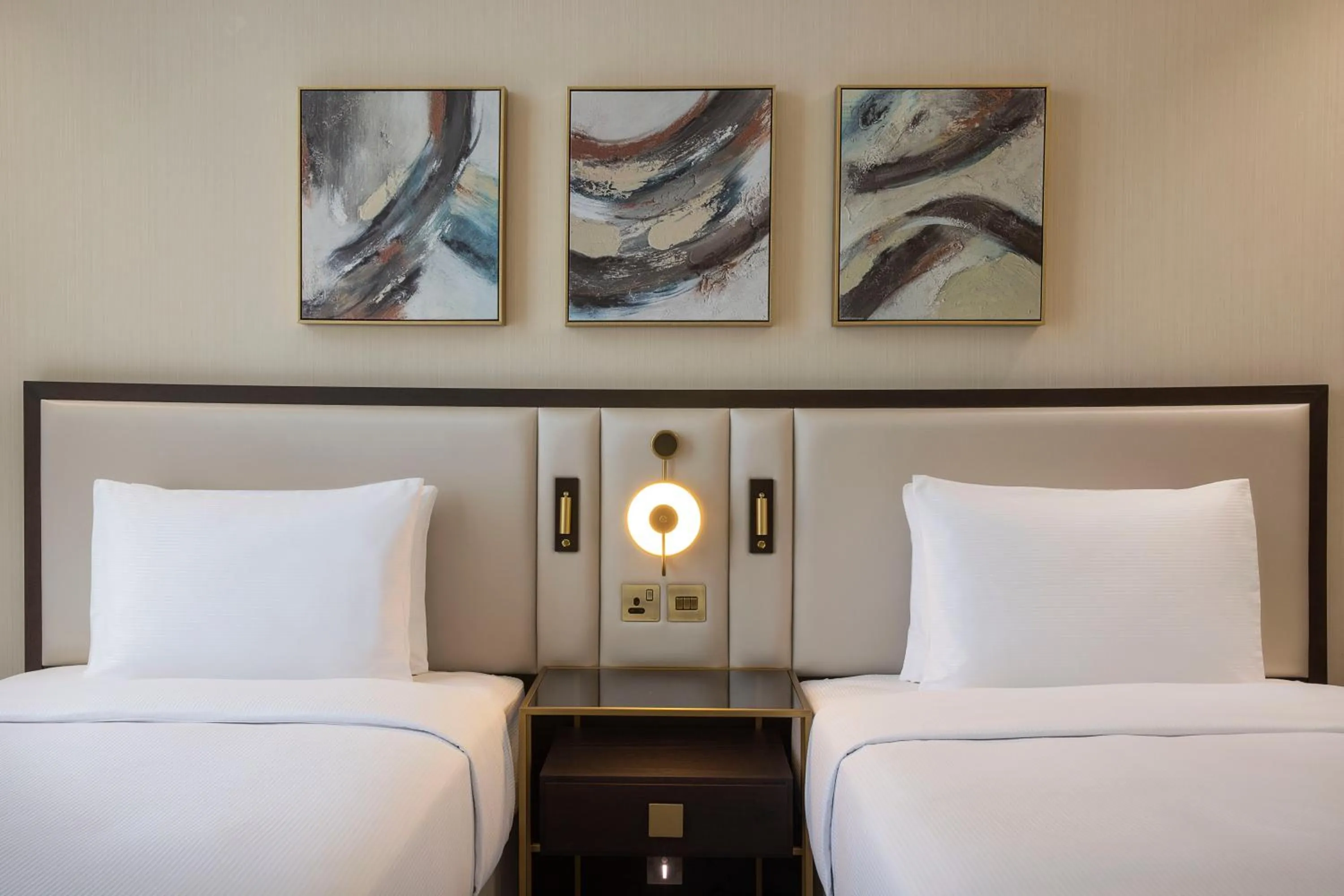 Bed in Hilton Bahrain City Centre Hotel & Residences