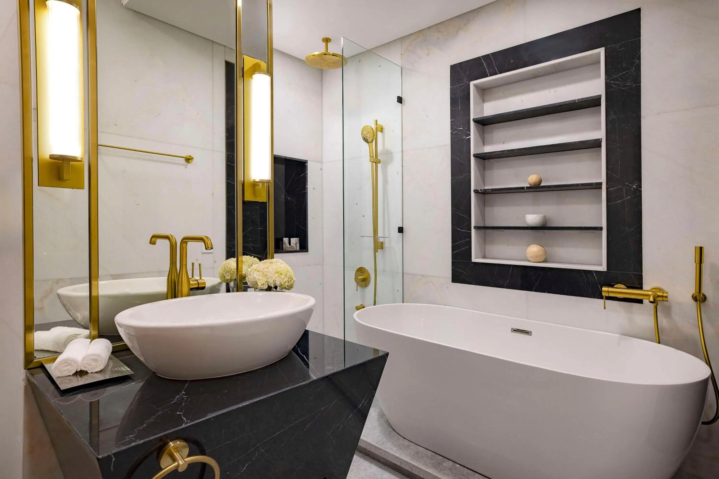 Shower in Hilton Bahrain City Centre Hotel & Residences