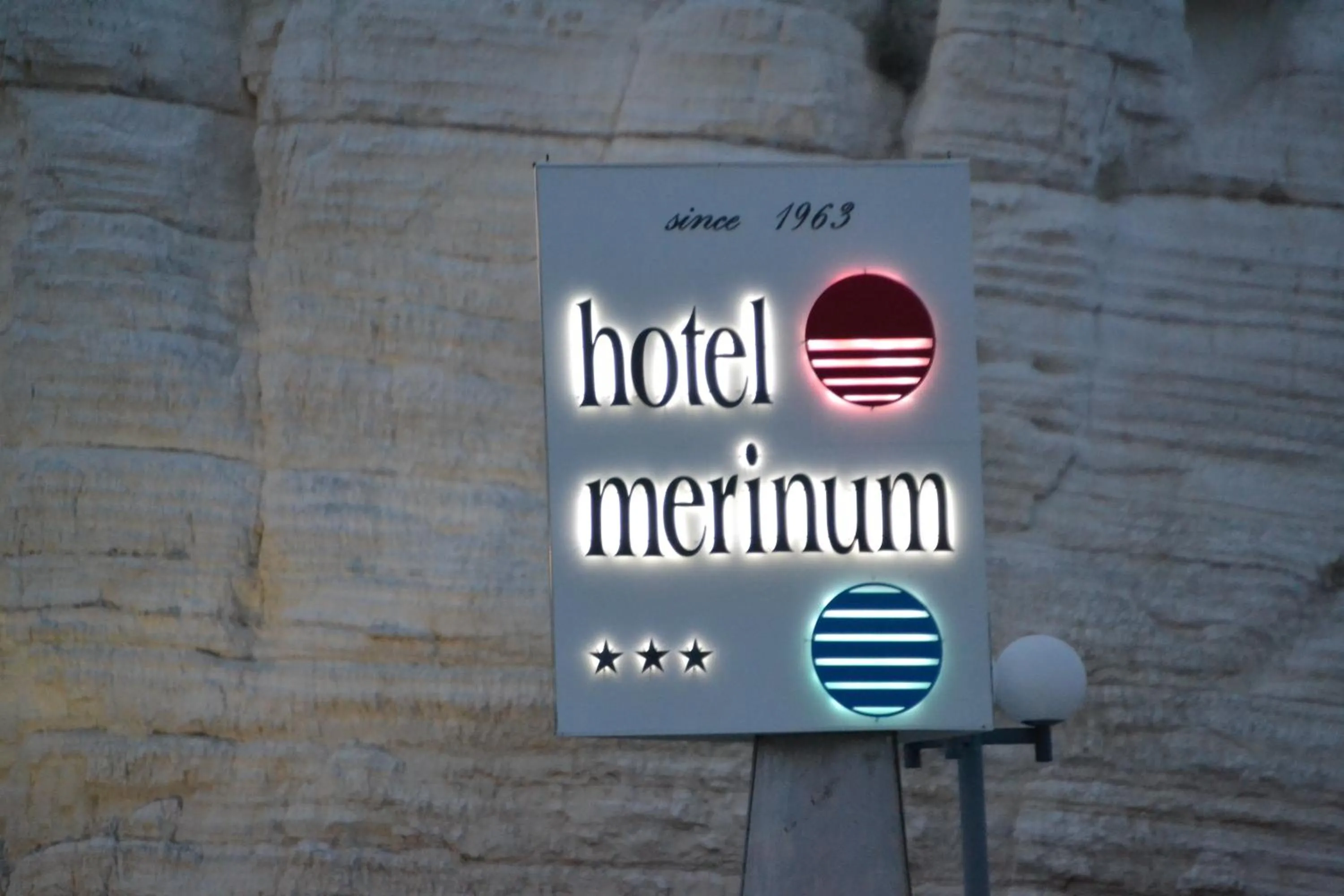 Property logo or sign in Hotel Merinum