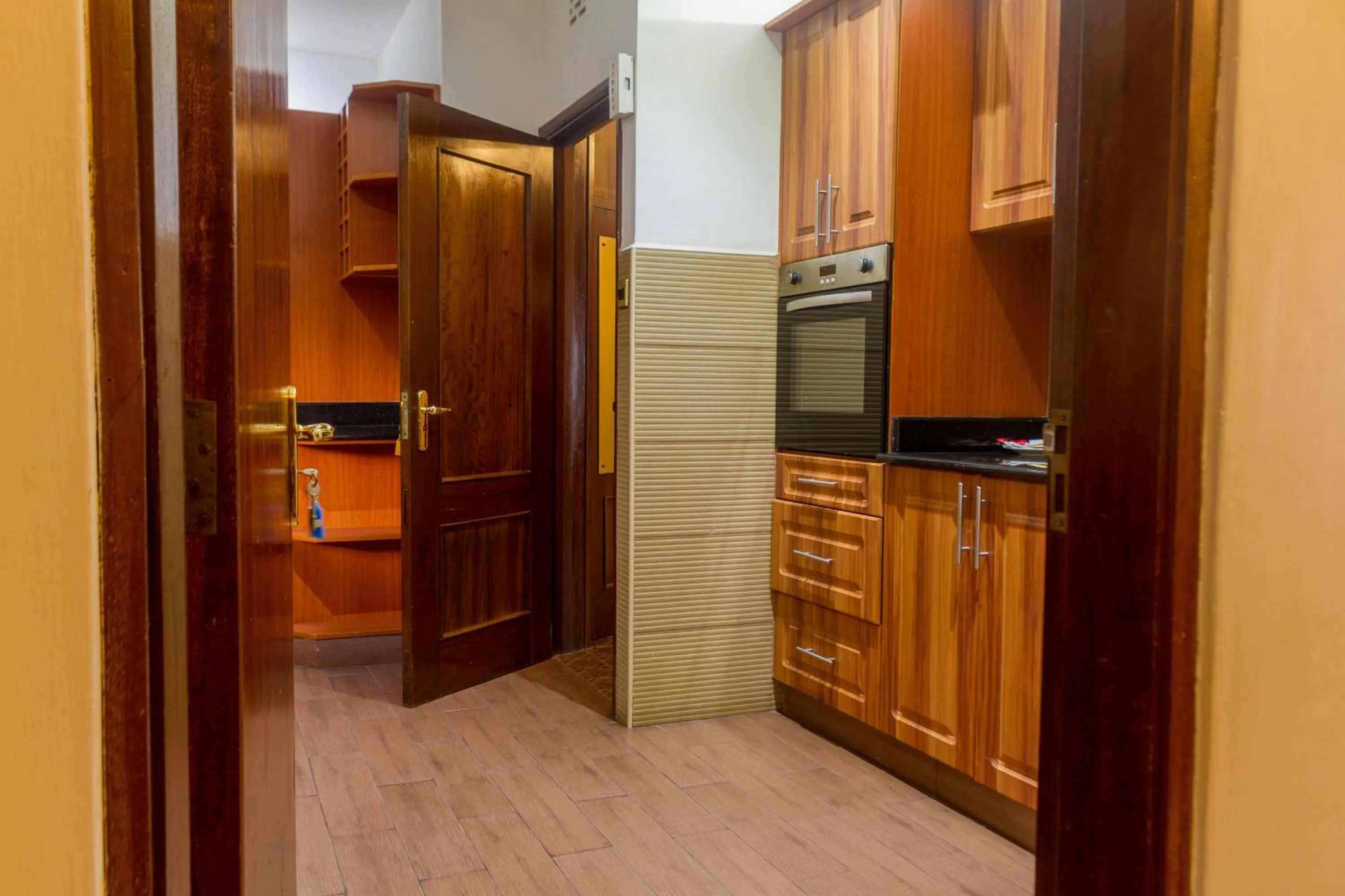 minibar in Mimosa Court Apartments