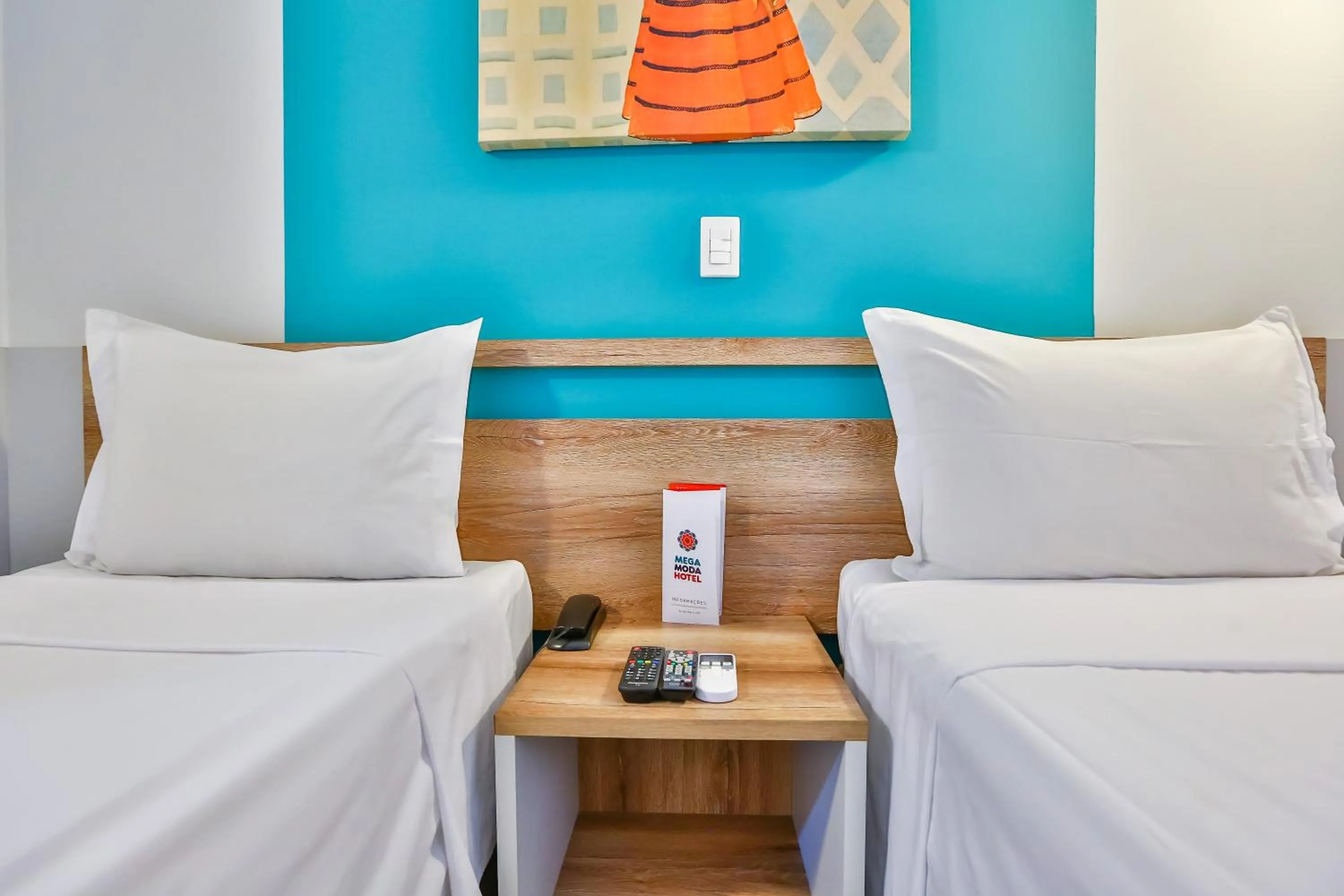 Bed in Mega Moda Goiania Hotel