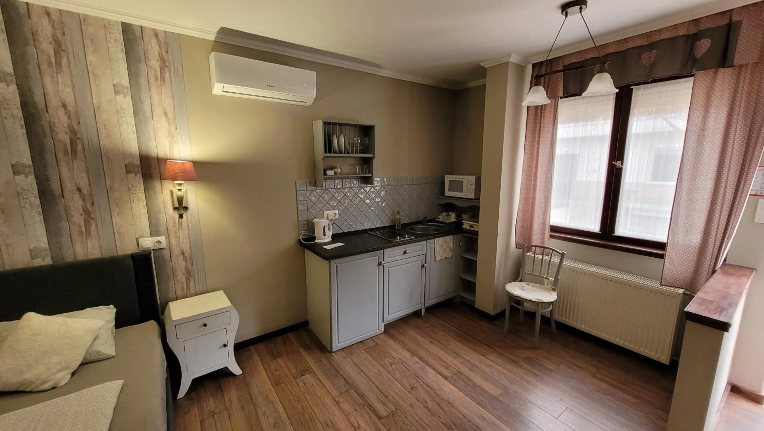 Kitchen or kitchenette, Bed in Guest House Romantika Panzio