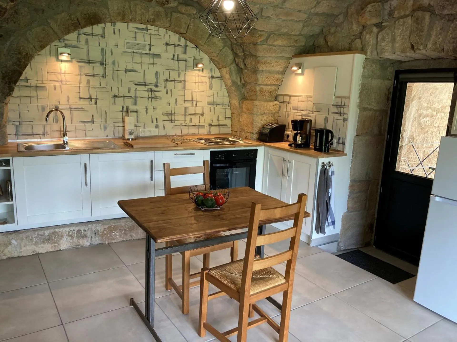 Kitchen or kitchenette in Mas de la Giralde - Gites