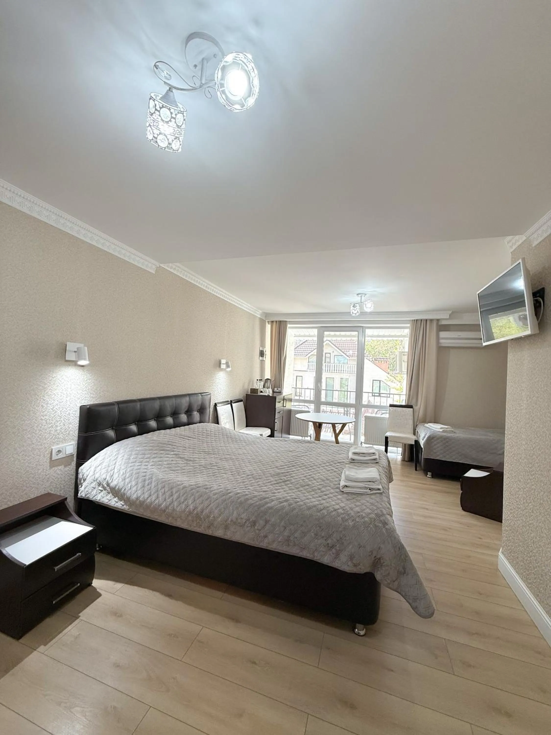 Photo of the whole room, Bed in Hotel Kalyan & Spa