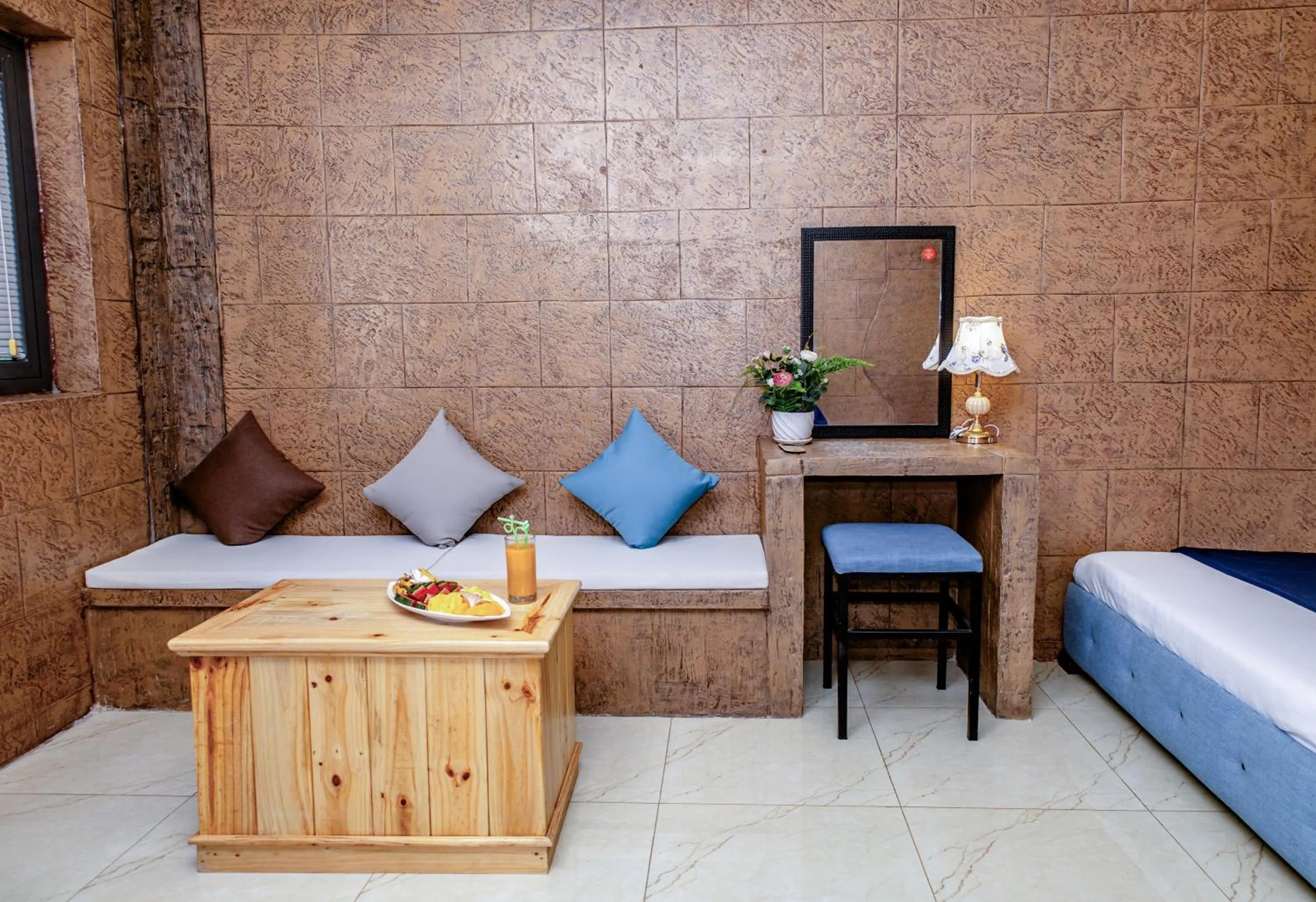 Seating area, Bed in Green Oasis Nha Trang Resort