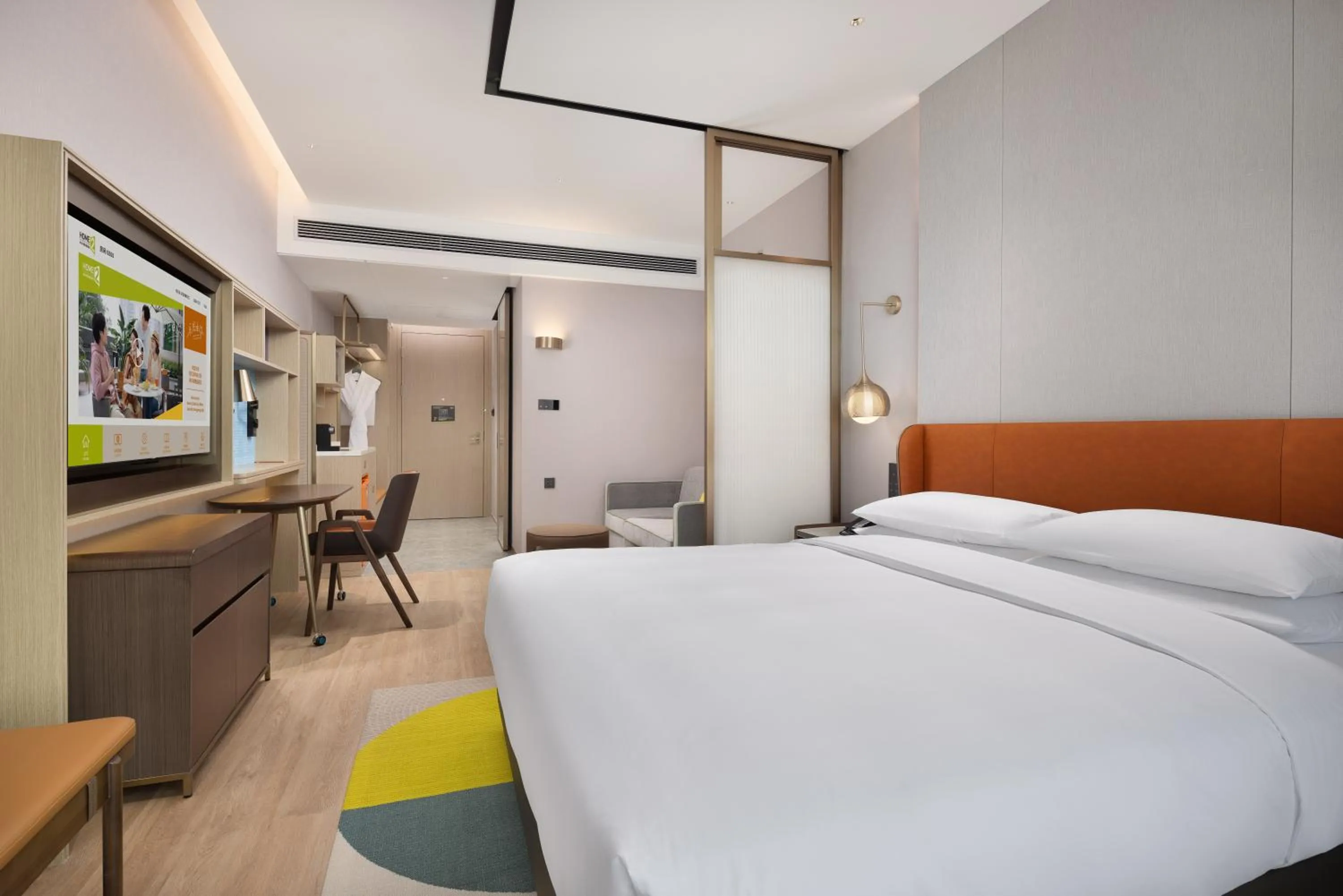 Photo of the whole room, Bed in Home2 Suite by Hilton Chongqing Wanzhou