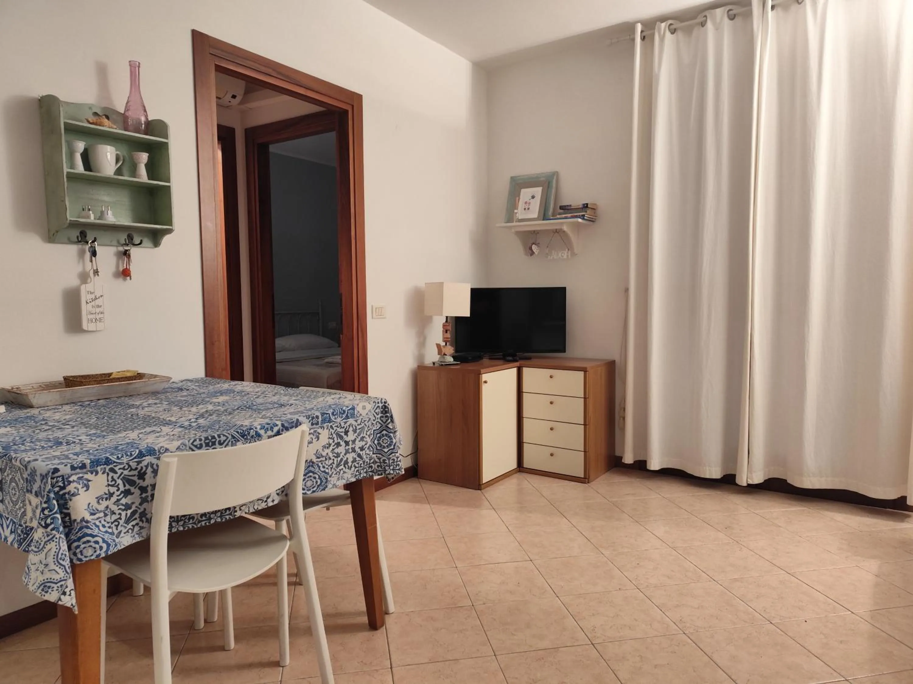 Dining area in BellaSirmione Holiday Apartments