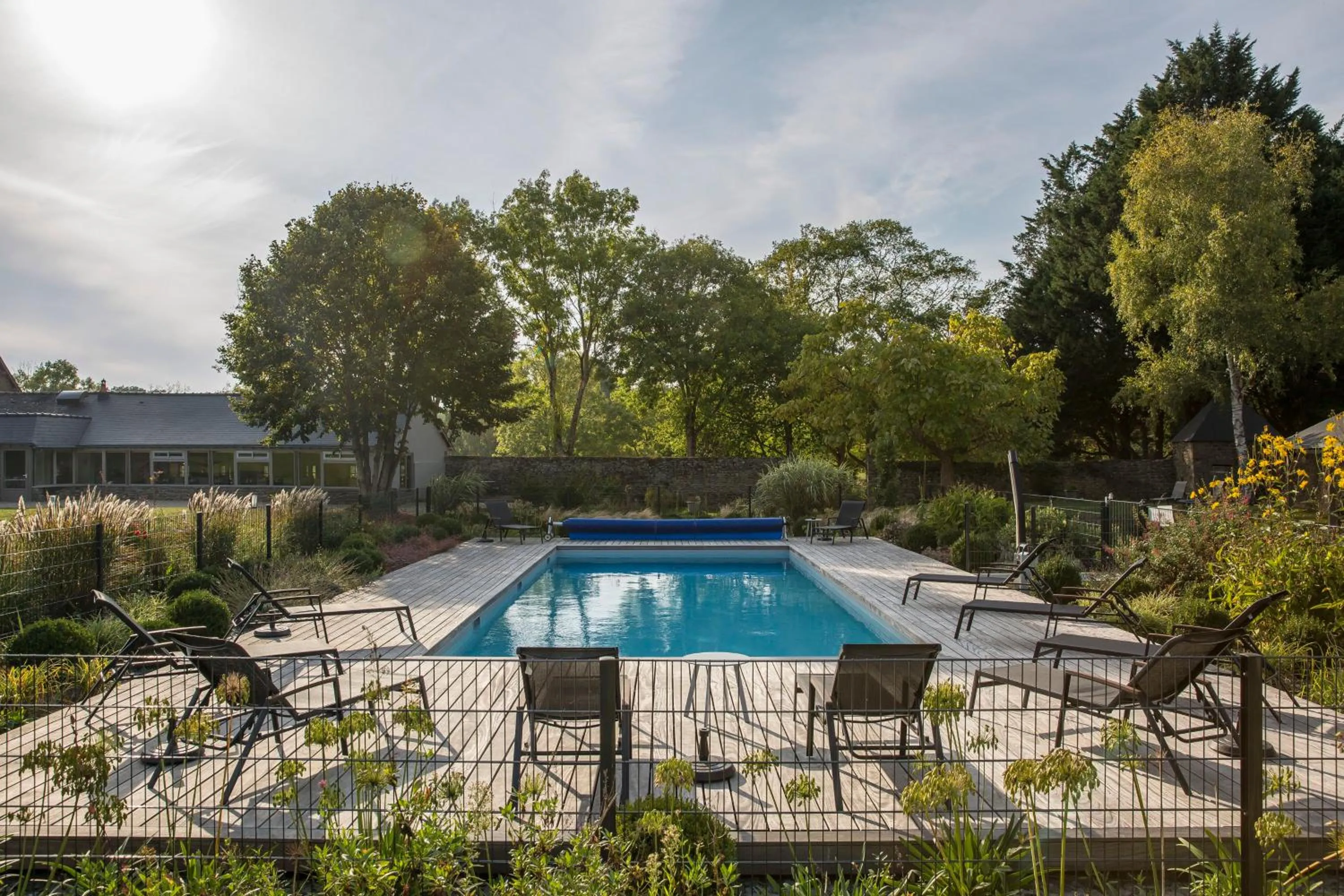 Swimming pool in Hotel de L'Abbaye Le Tronchet - Handwritten Collection