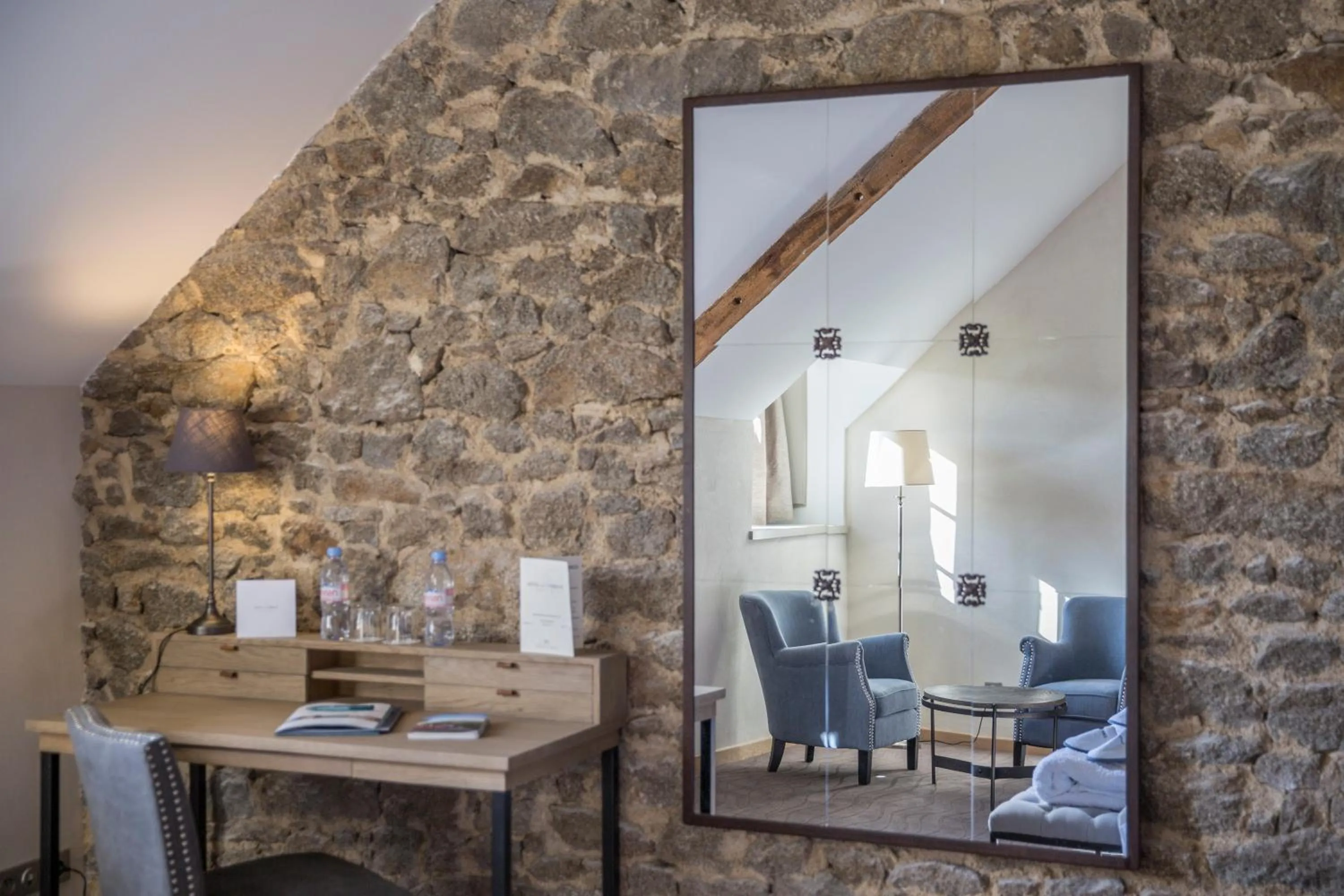 Seating area in Hotel de L'Abbaye Le Tronchet - Handwritten Collection
