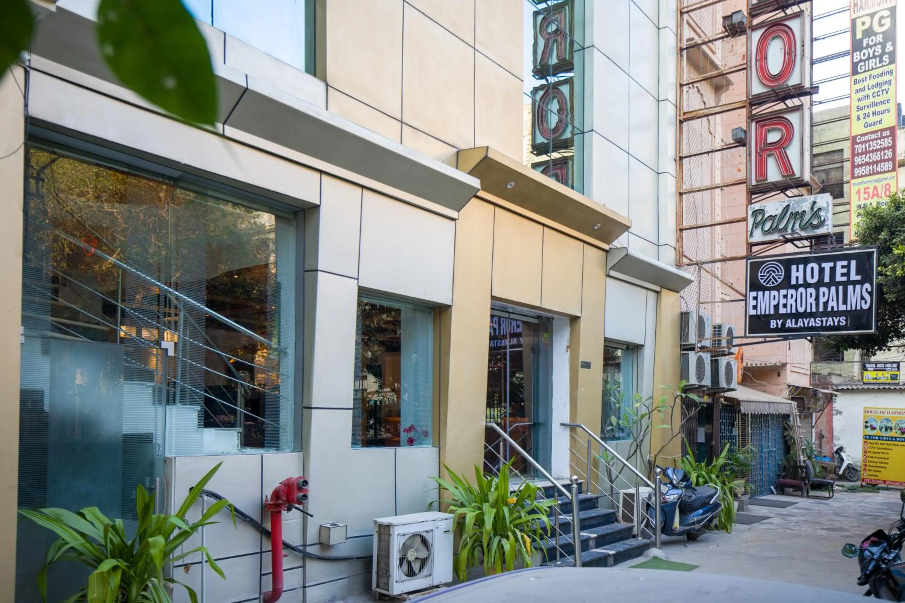 Property building in Alaya Stays Hotel Emperor Palms