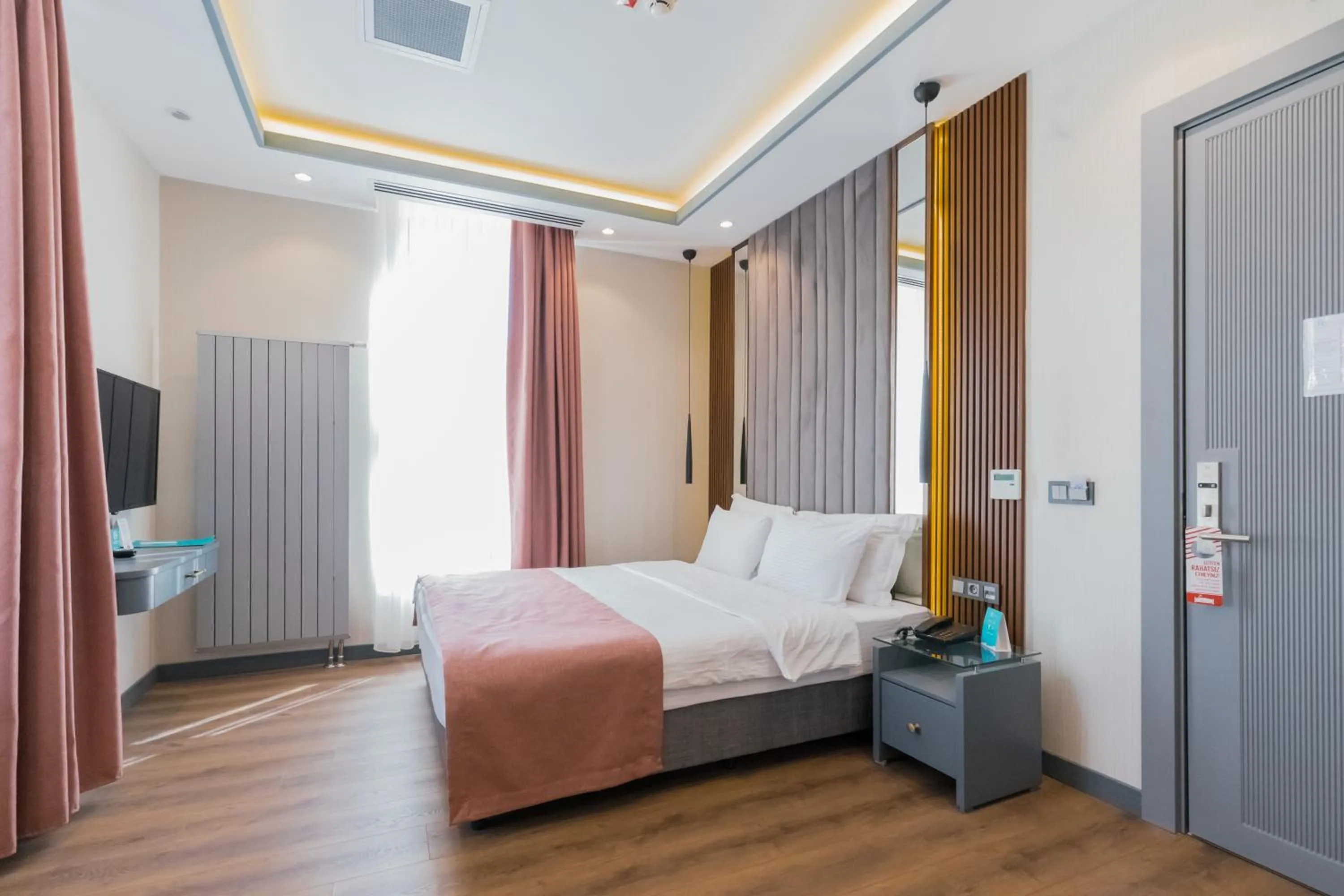 Bed in VE Hotels Adakale