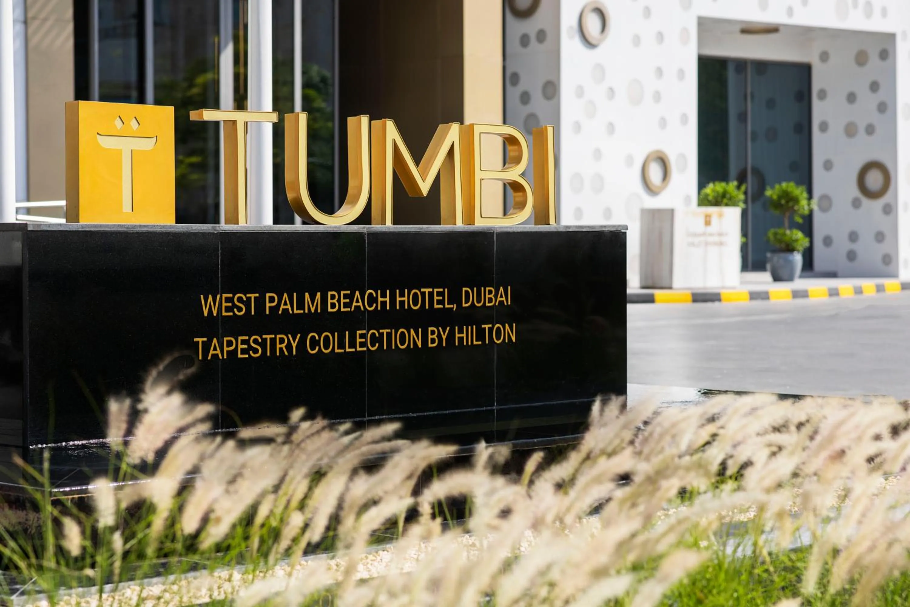 Property logo or sign in Tumbi Hotel Dubai The Palm,Tapestry Collection Hilton