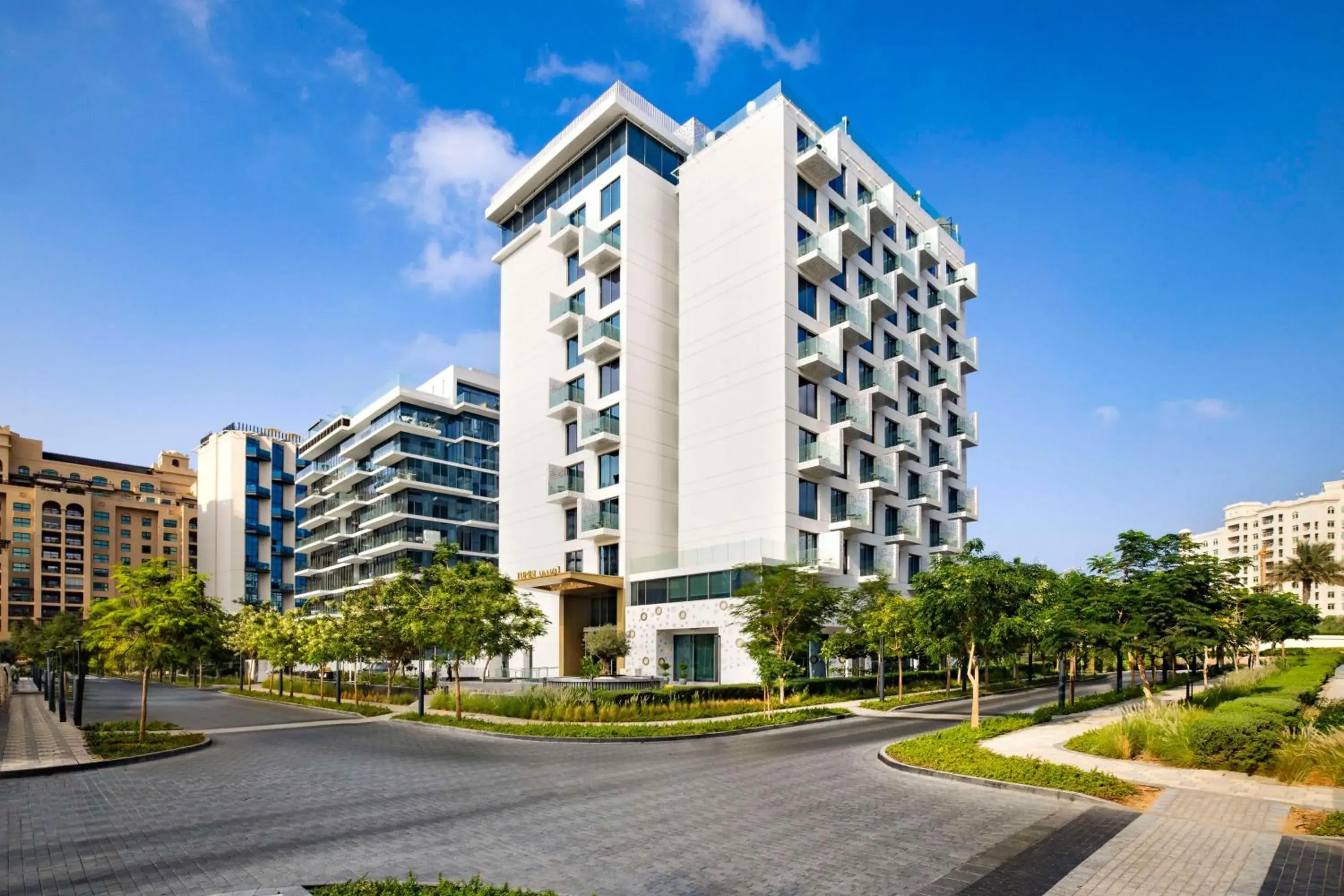 Property building in Tumbi Hotel Dubai The Palm,Tapestry Collection Hilton Property building in Tumbi Hotel Dubai The Palm,Tapestry Collection Hilton