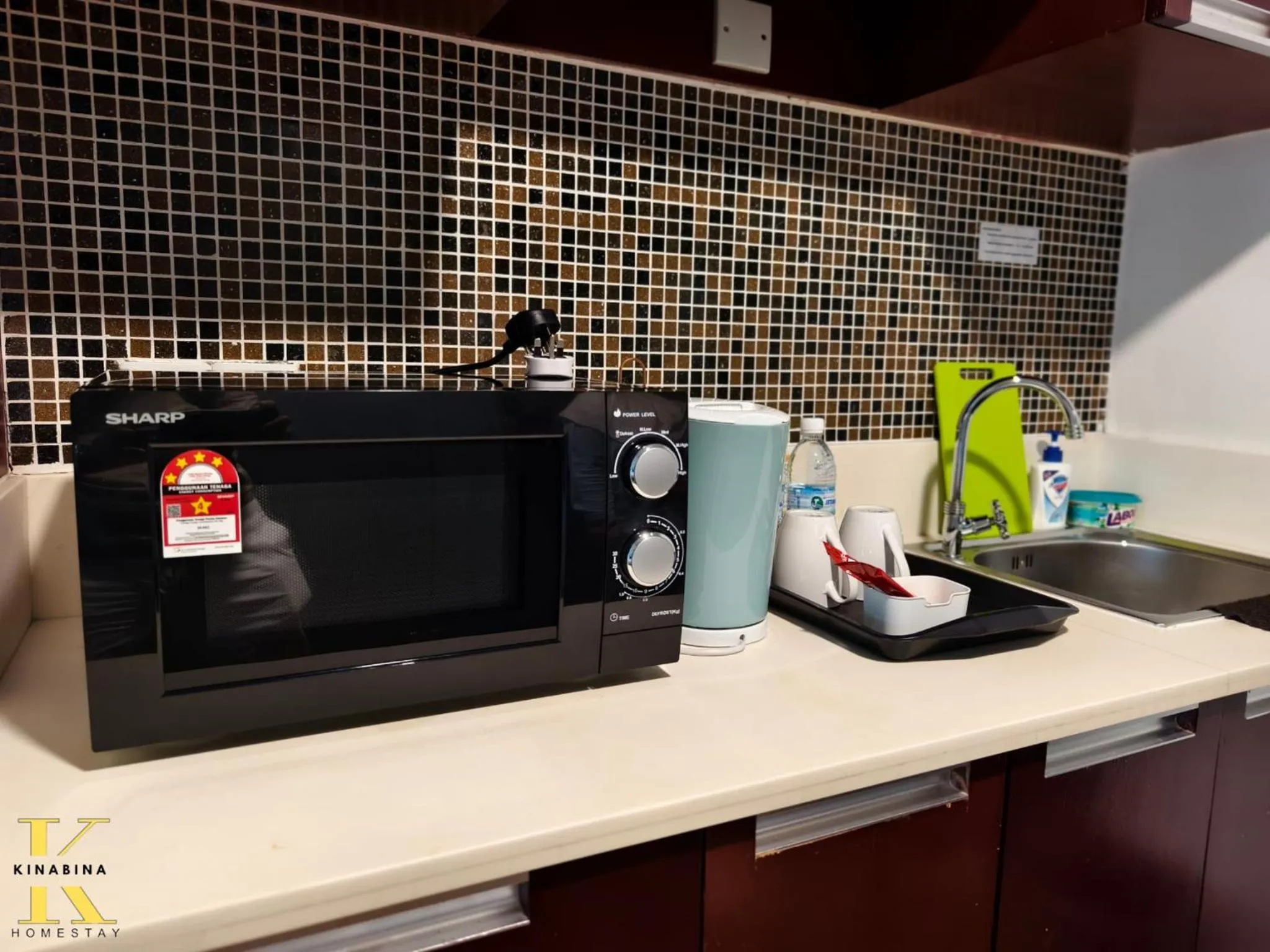 microwave in South China Sea Place by Kinabina Homestay